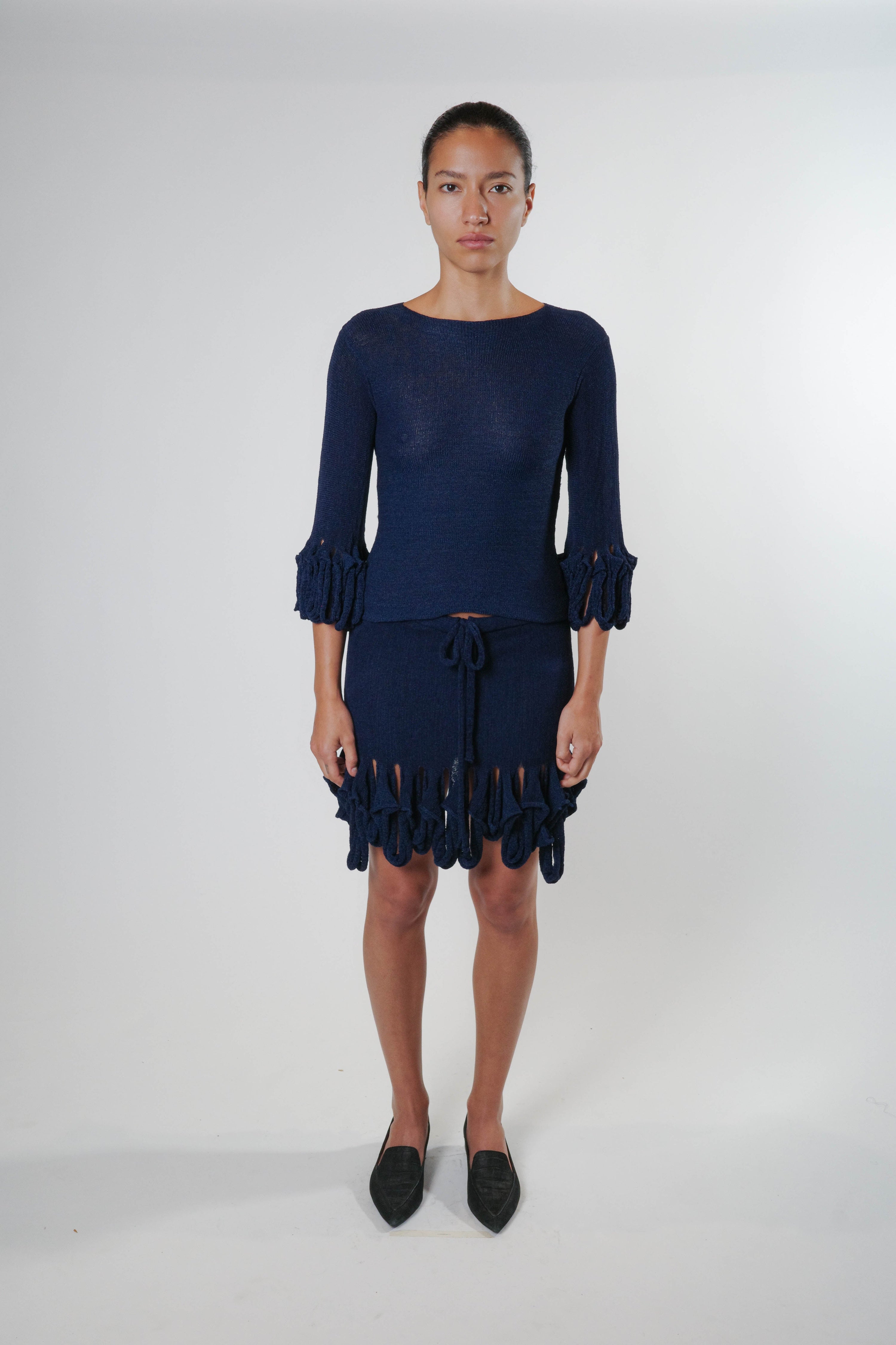 Swiggle mini skirt