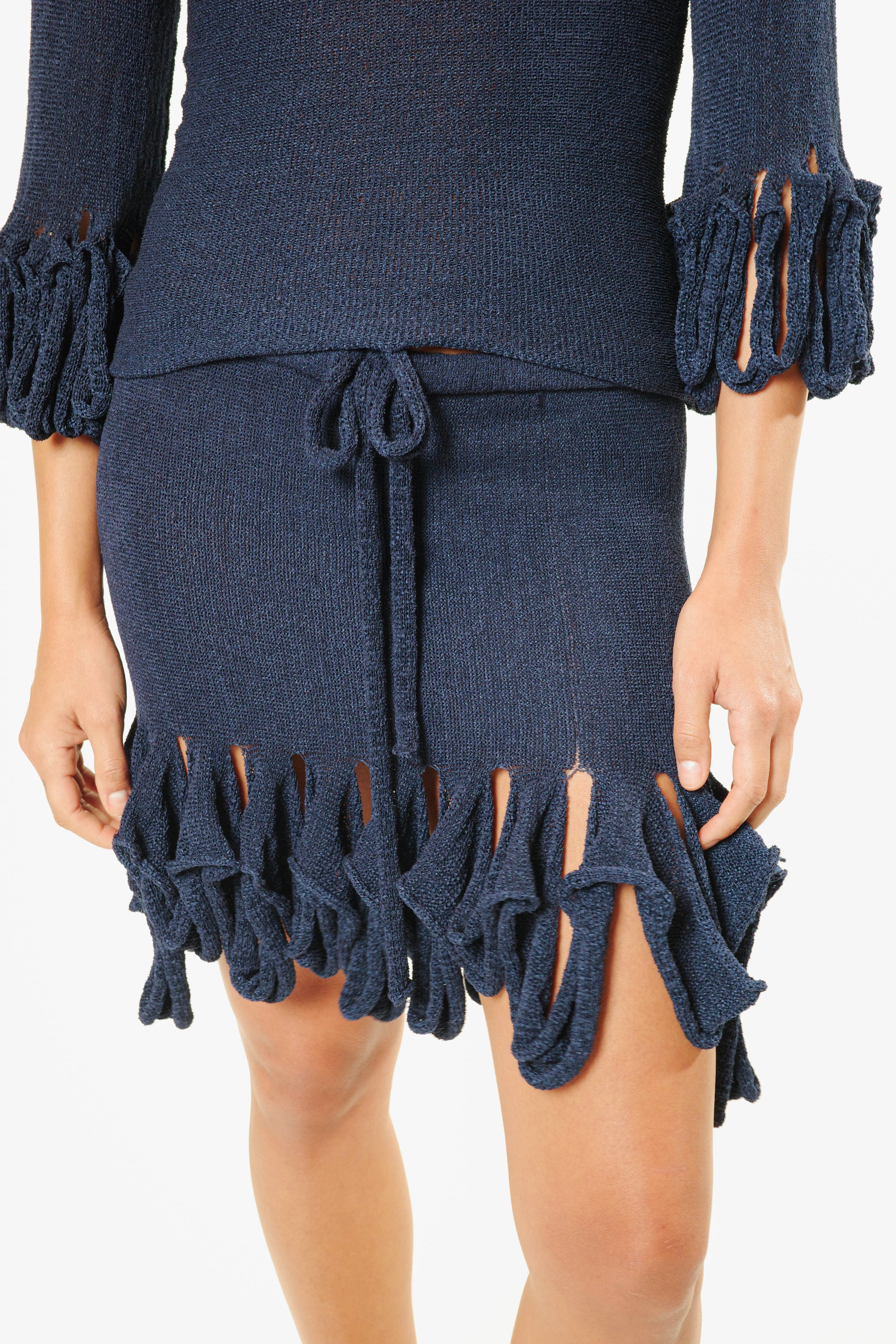 Swiggle mini skirt