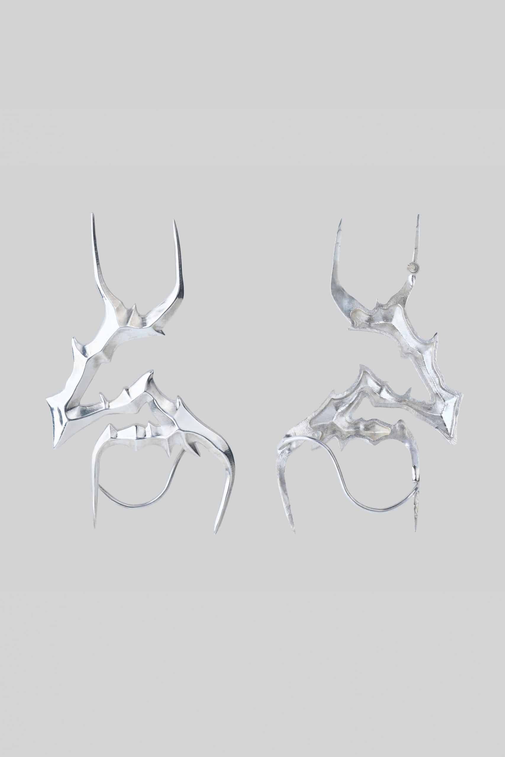 Silver symbolic s earrings