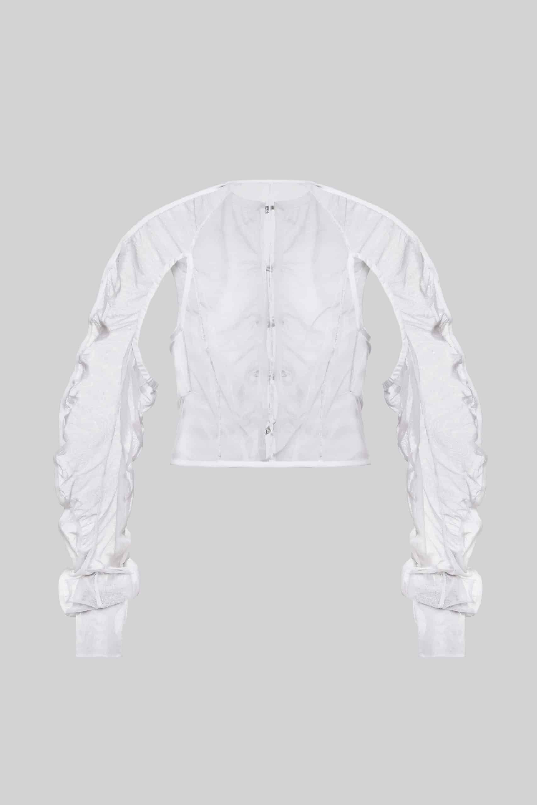 Sheer white blouse with nail buttons