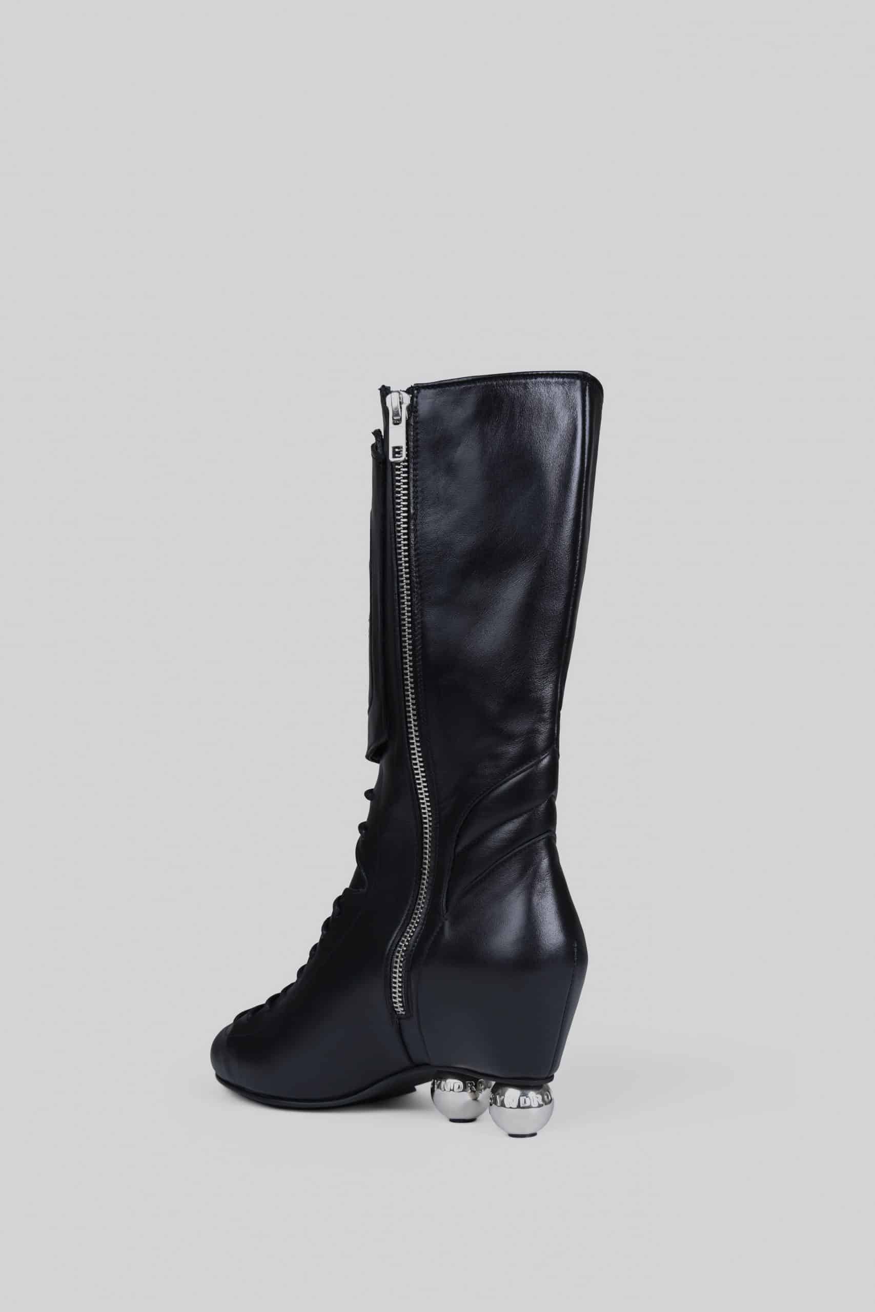 Black ankle roller boots