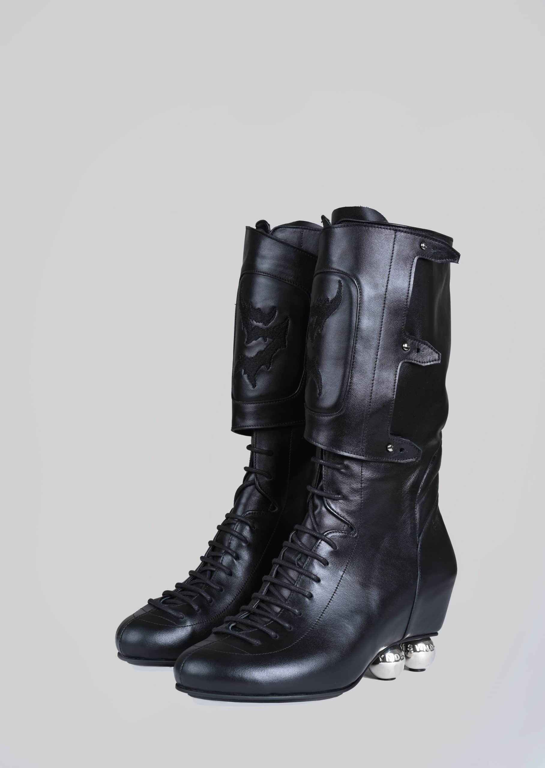 Black ankle roller boots