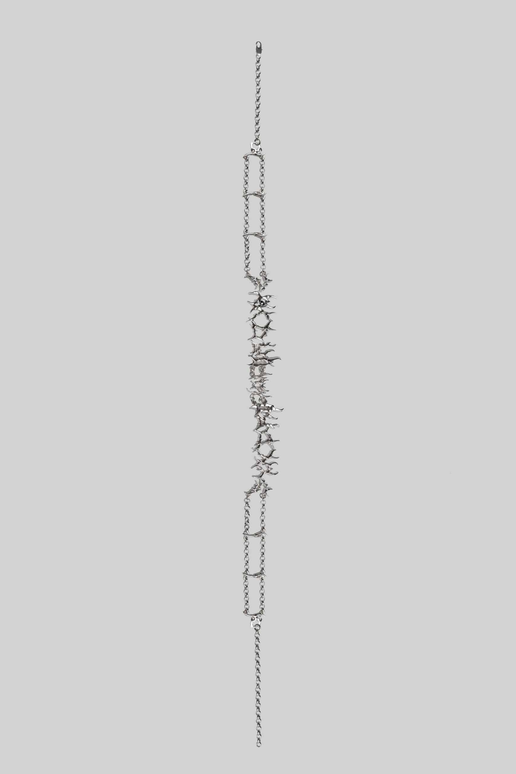 Silver syndrom necklace