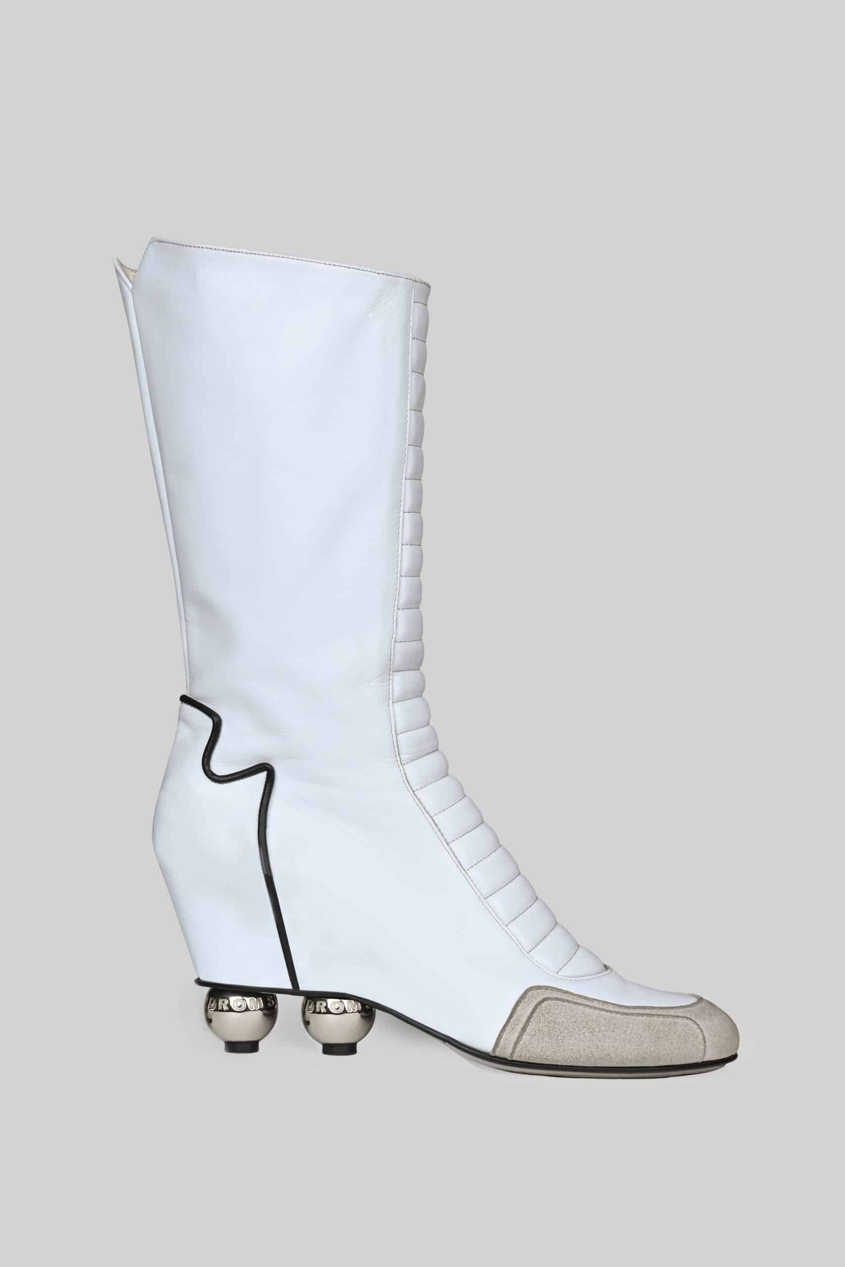 White knee high roller boots
