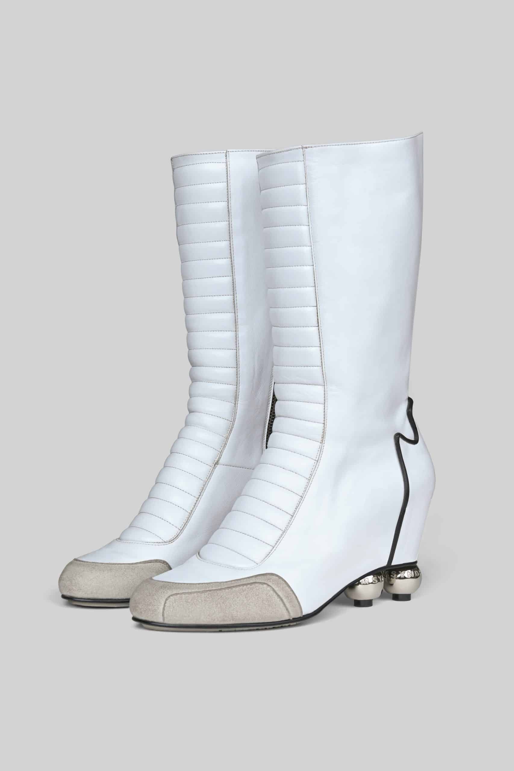 White knee high roller boots