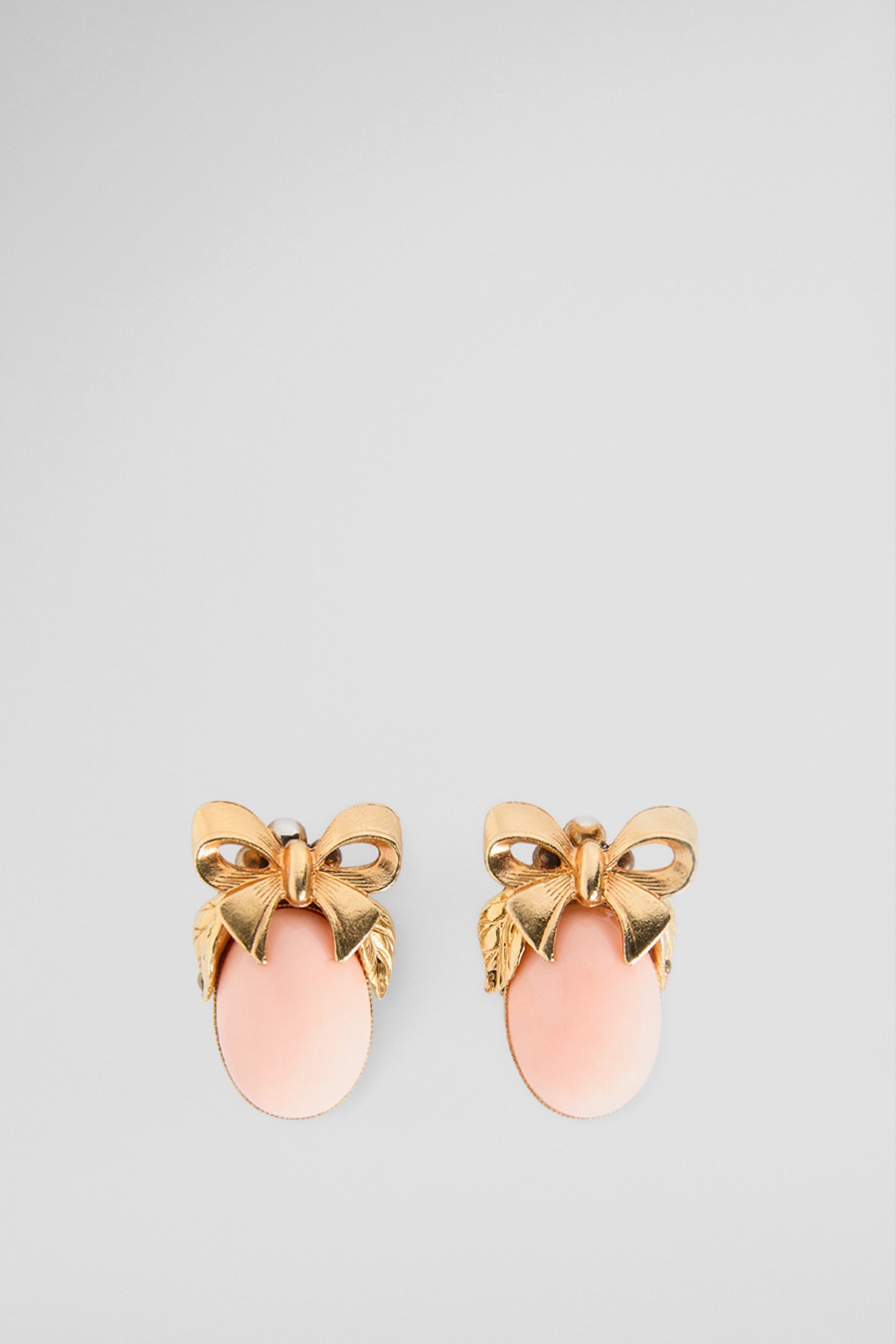 Pink bow clip earrings