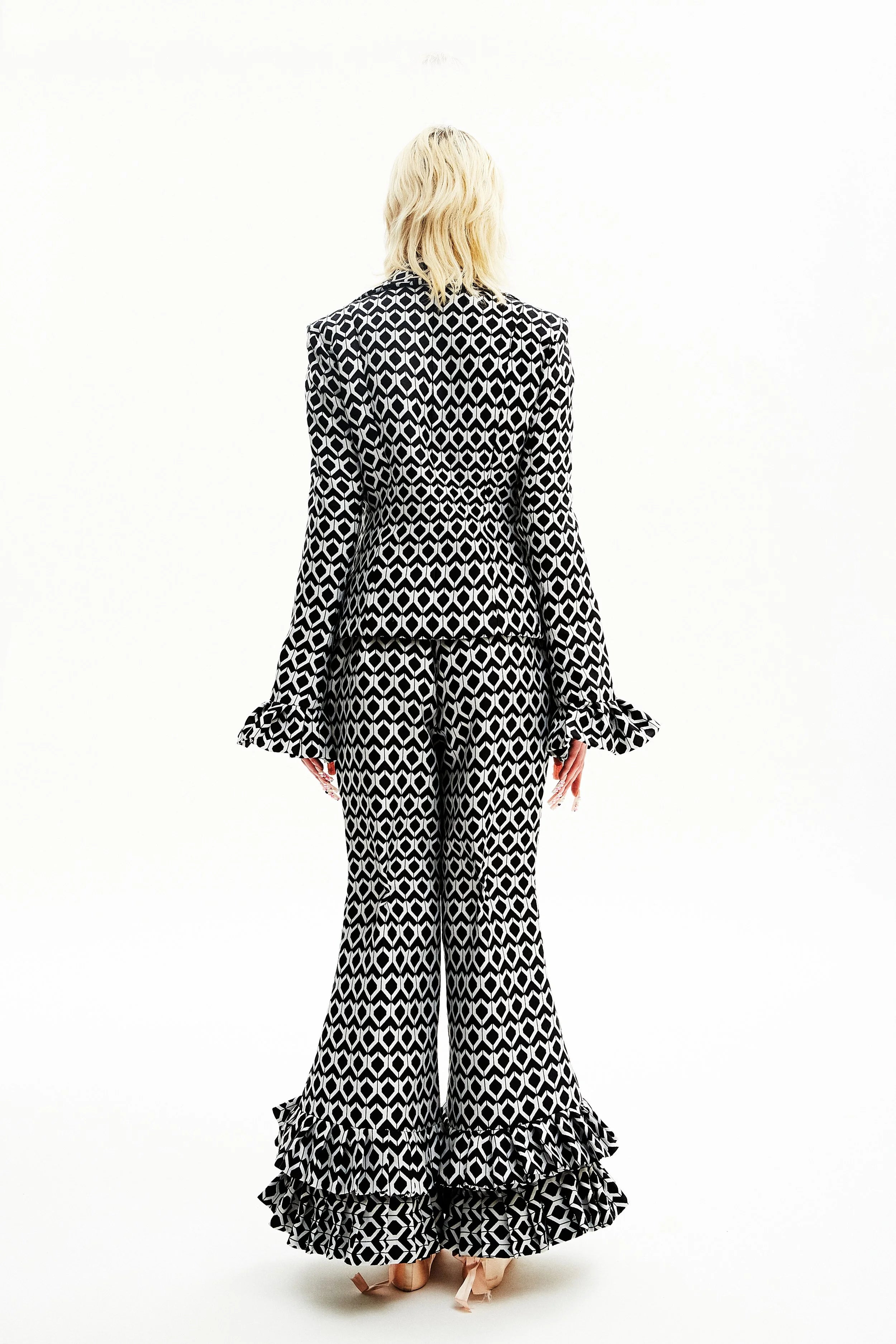 Veste noire et blanche géométrique