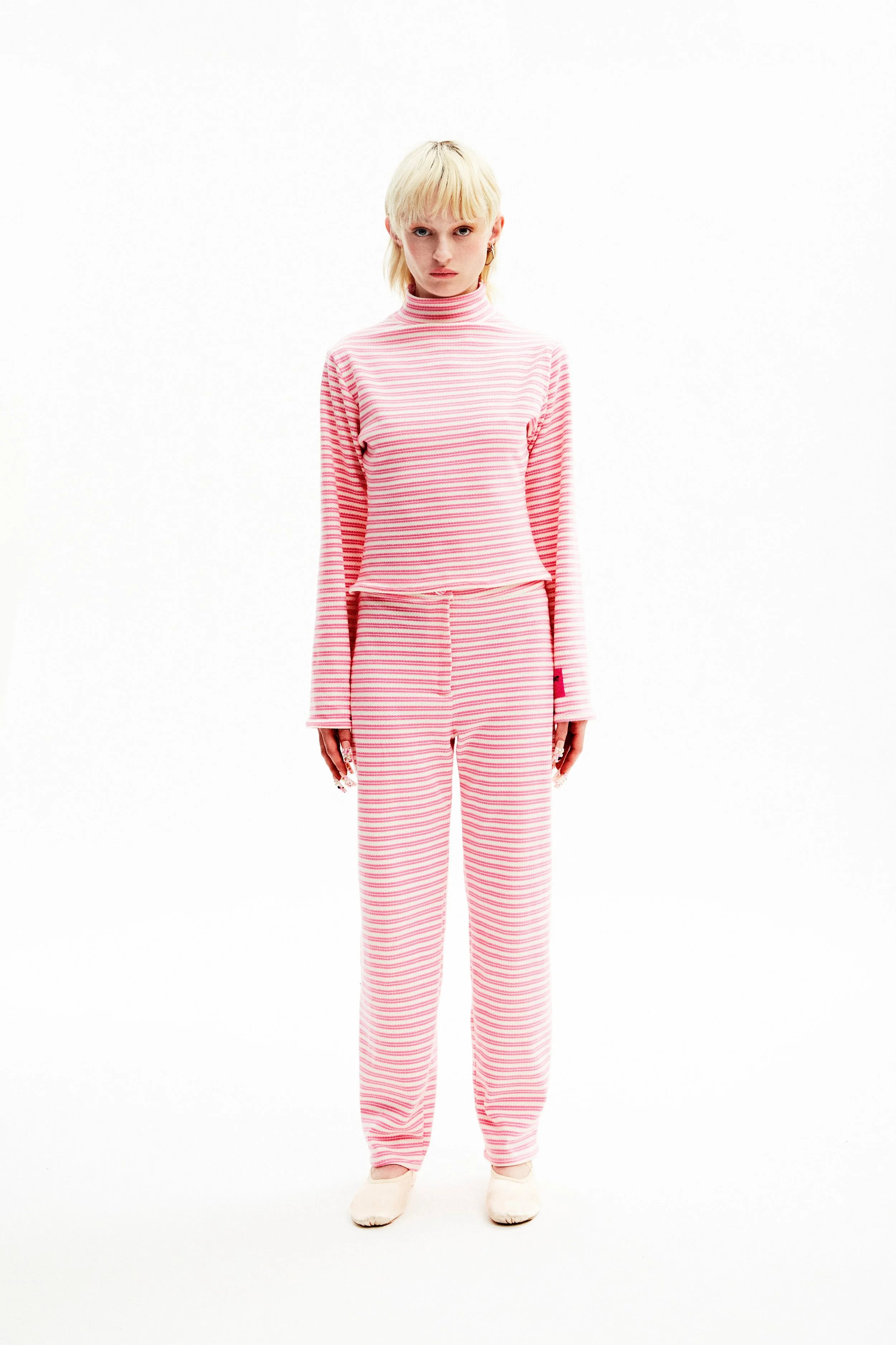 Pantalon à rayures rose et blanc