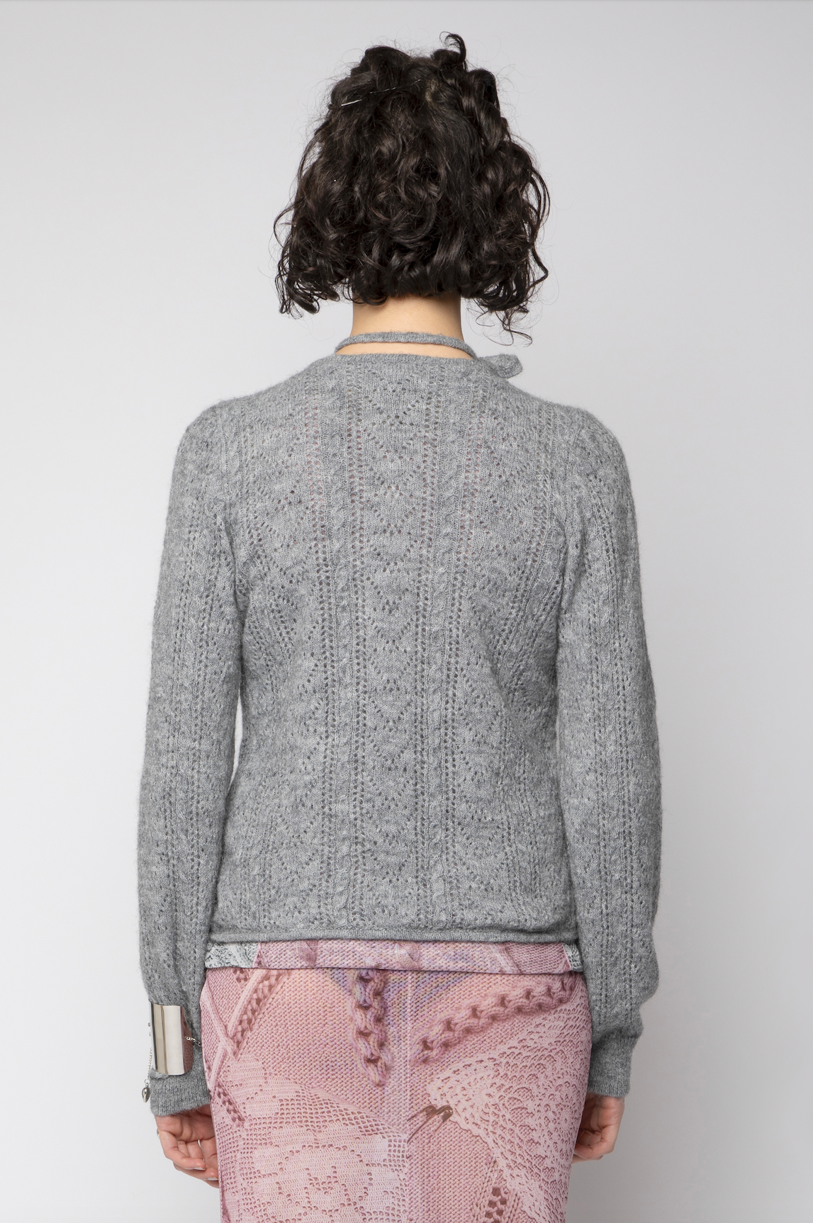 Cardigan intreccio amoroso