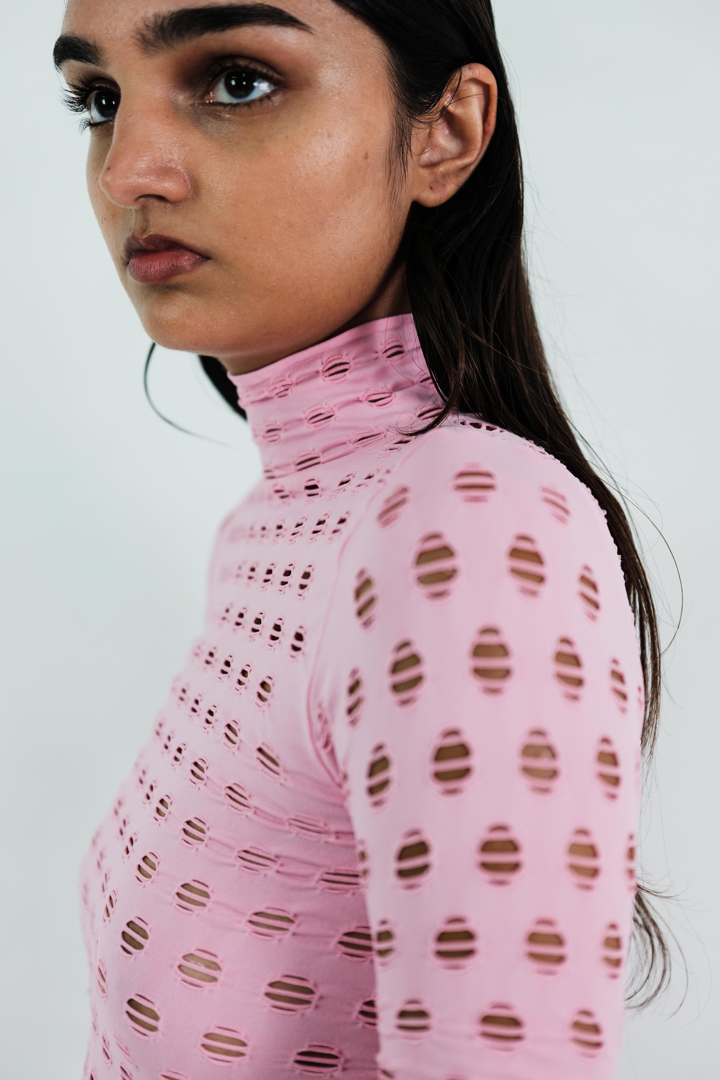 Perforated turtleneck