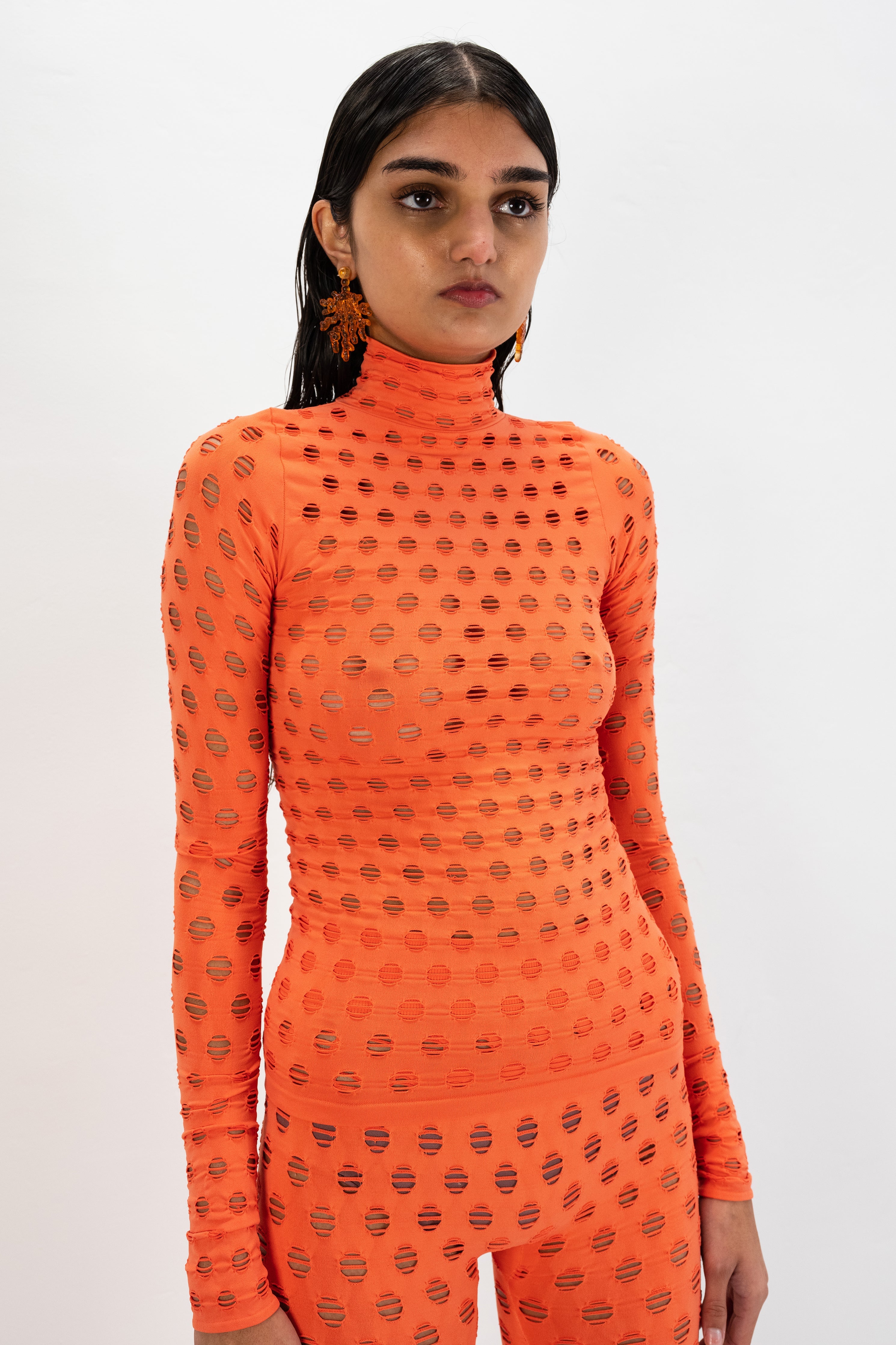 Perforated turtleneck