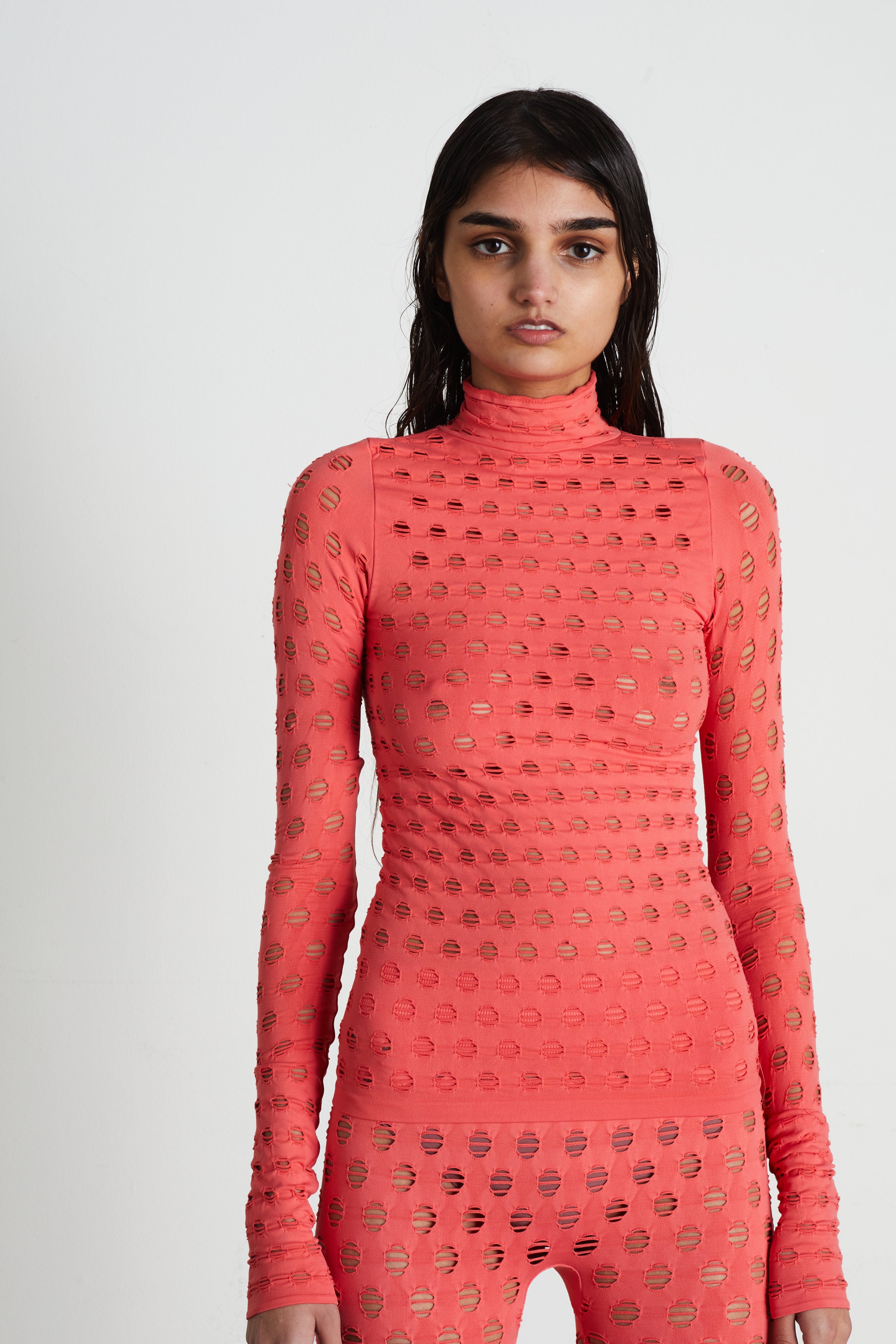 Perforated turtleneck