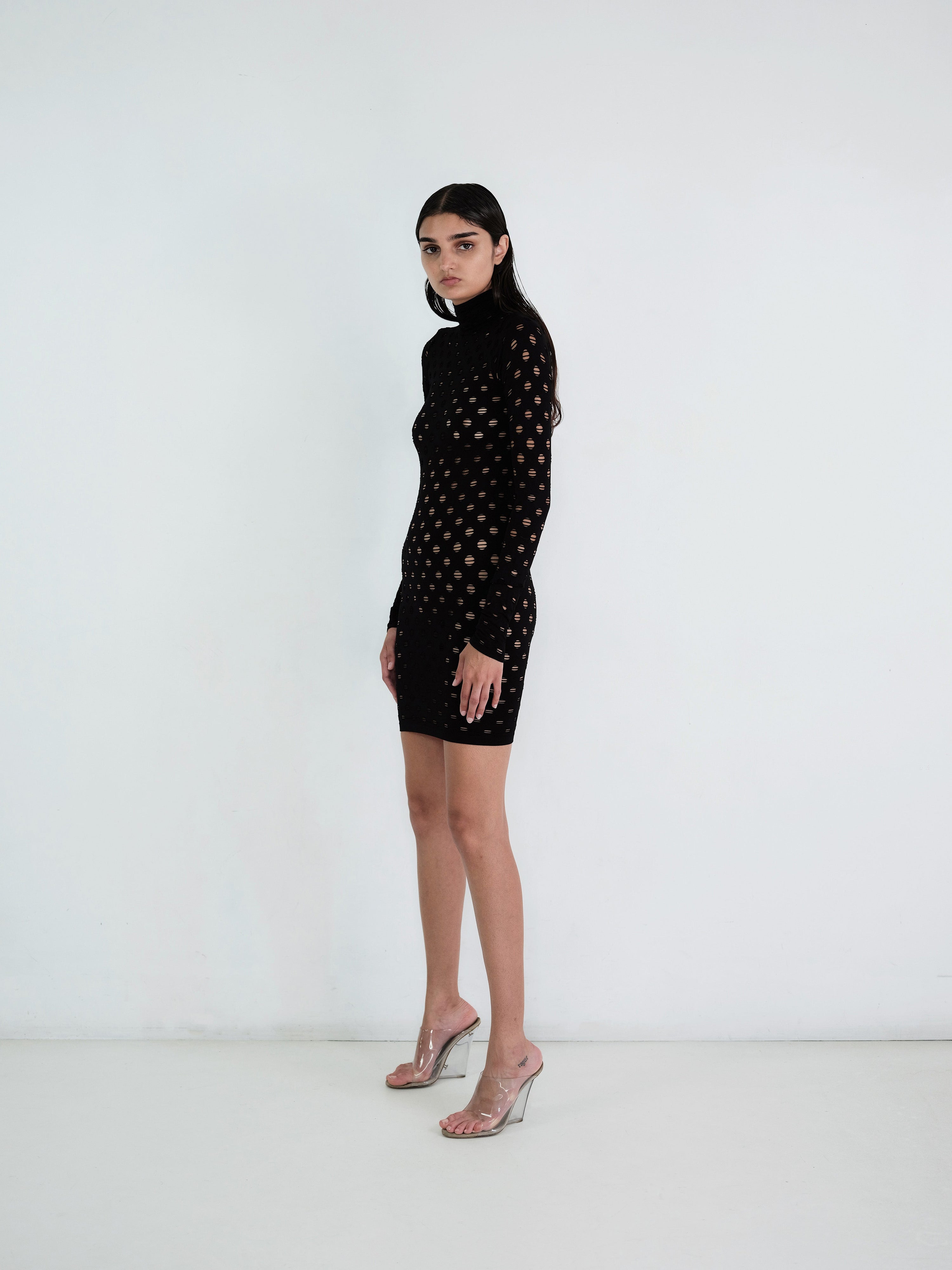 Perforated turtleneck dress