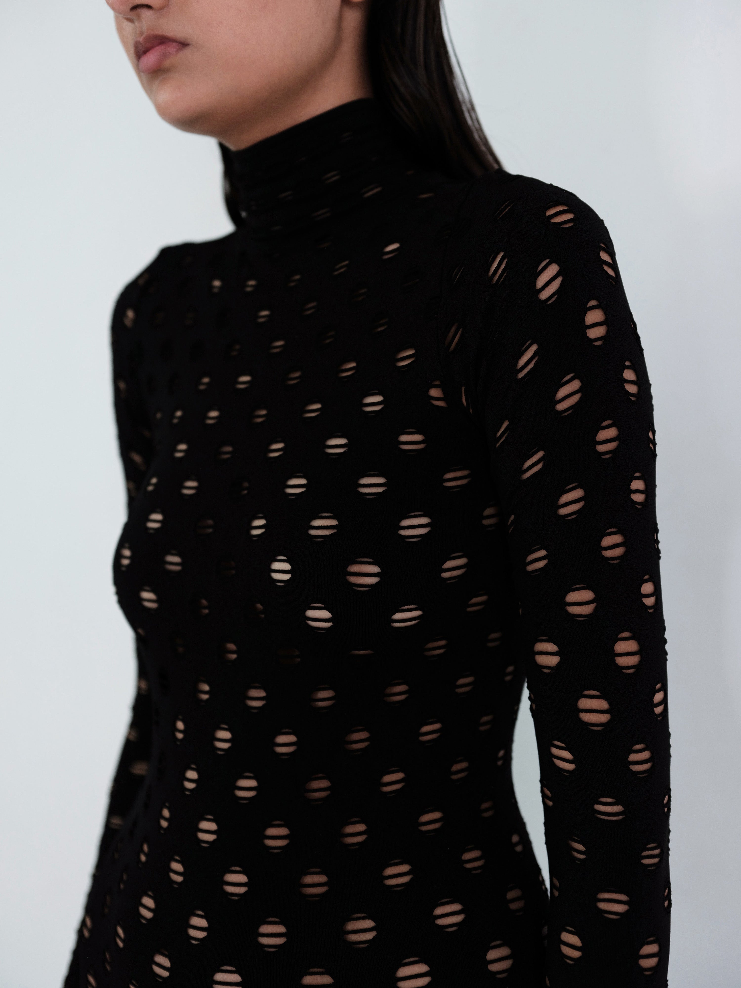 Perforated turtleneck dress