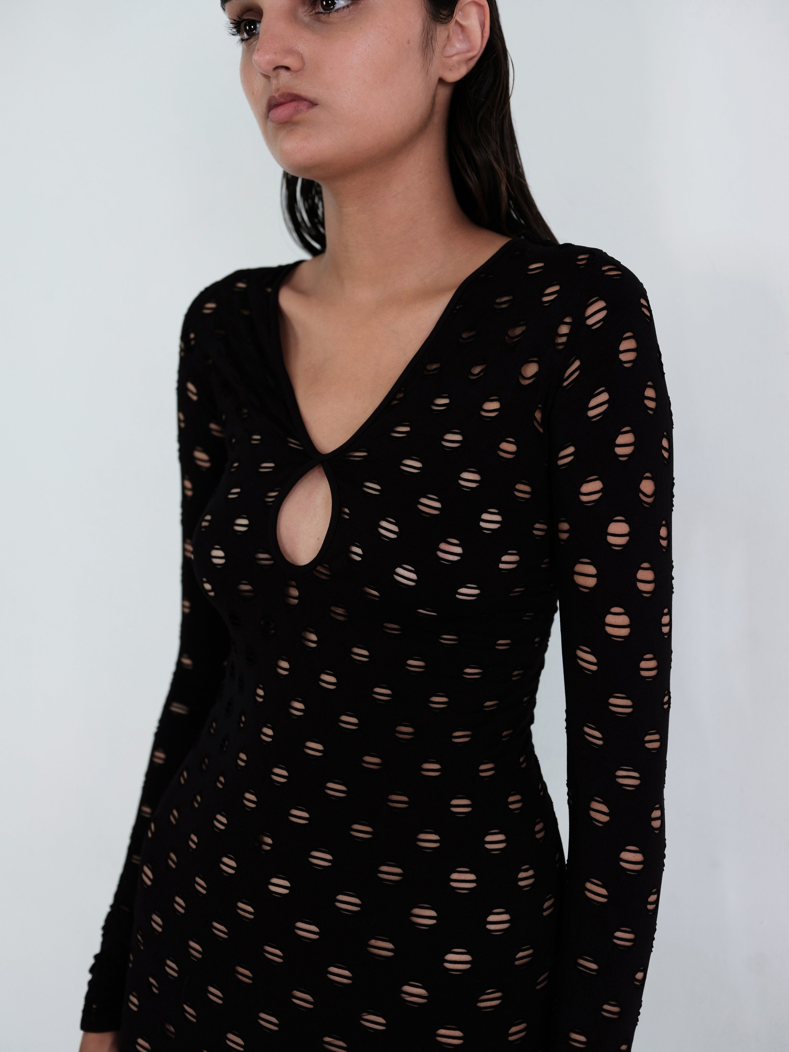 Perforated gown