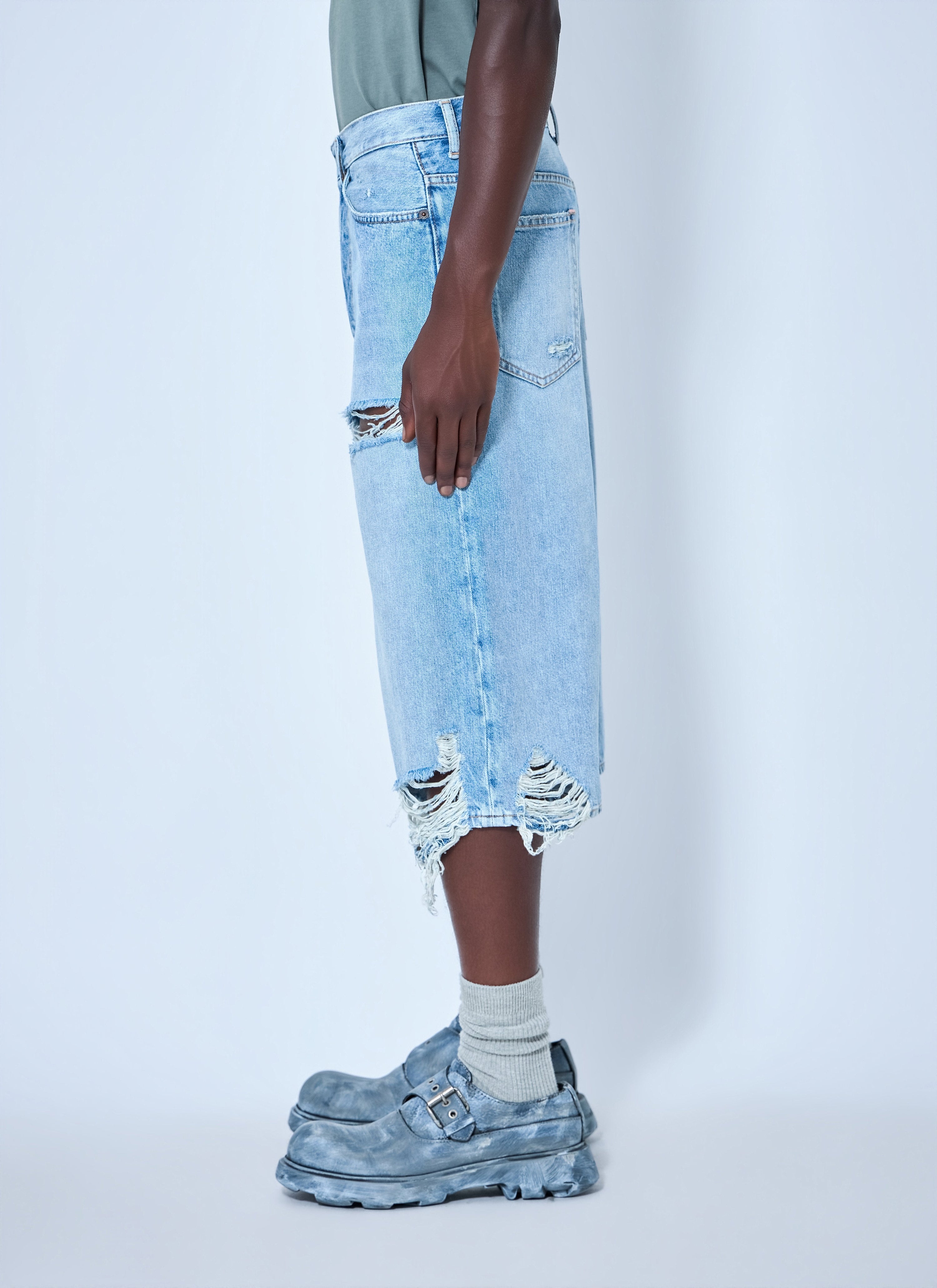 Distressed denim shorts