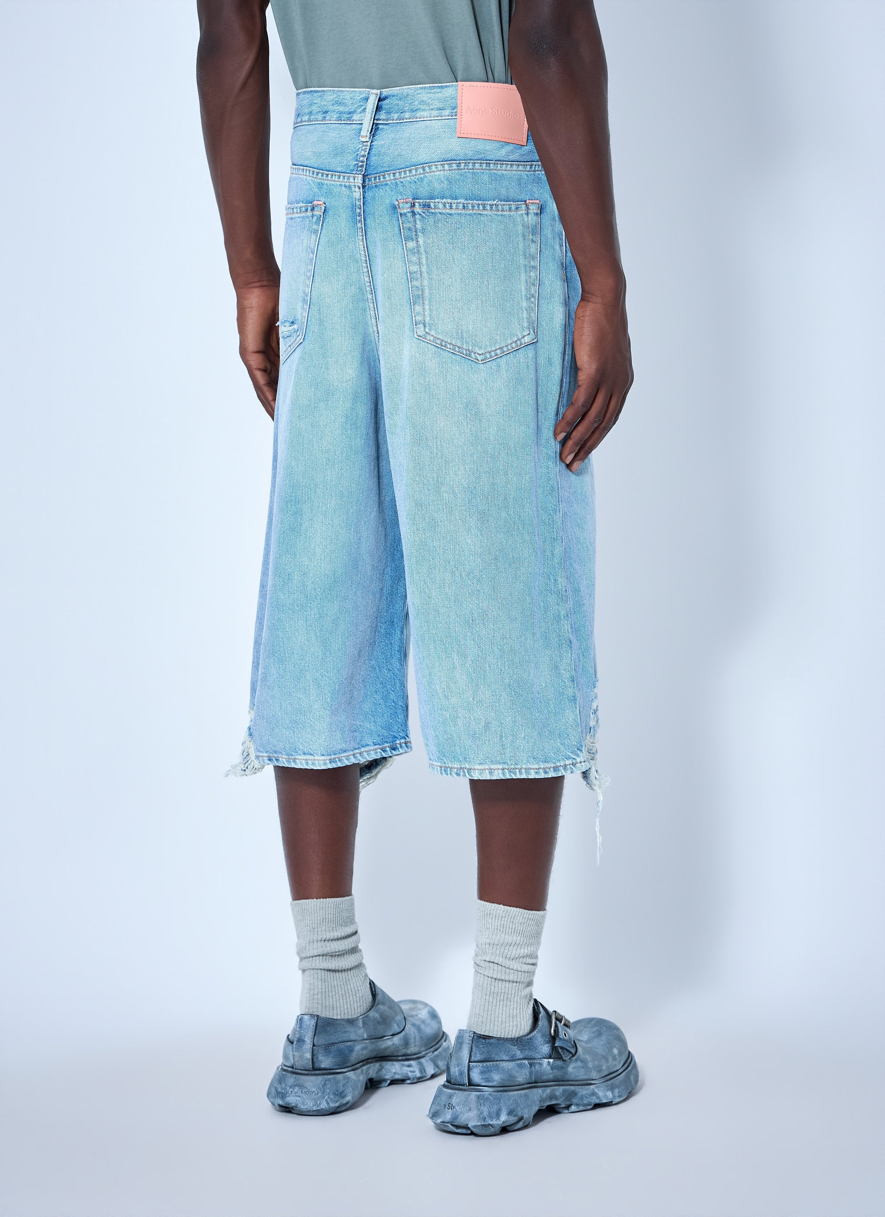 Distressed denim shorts