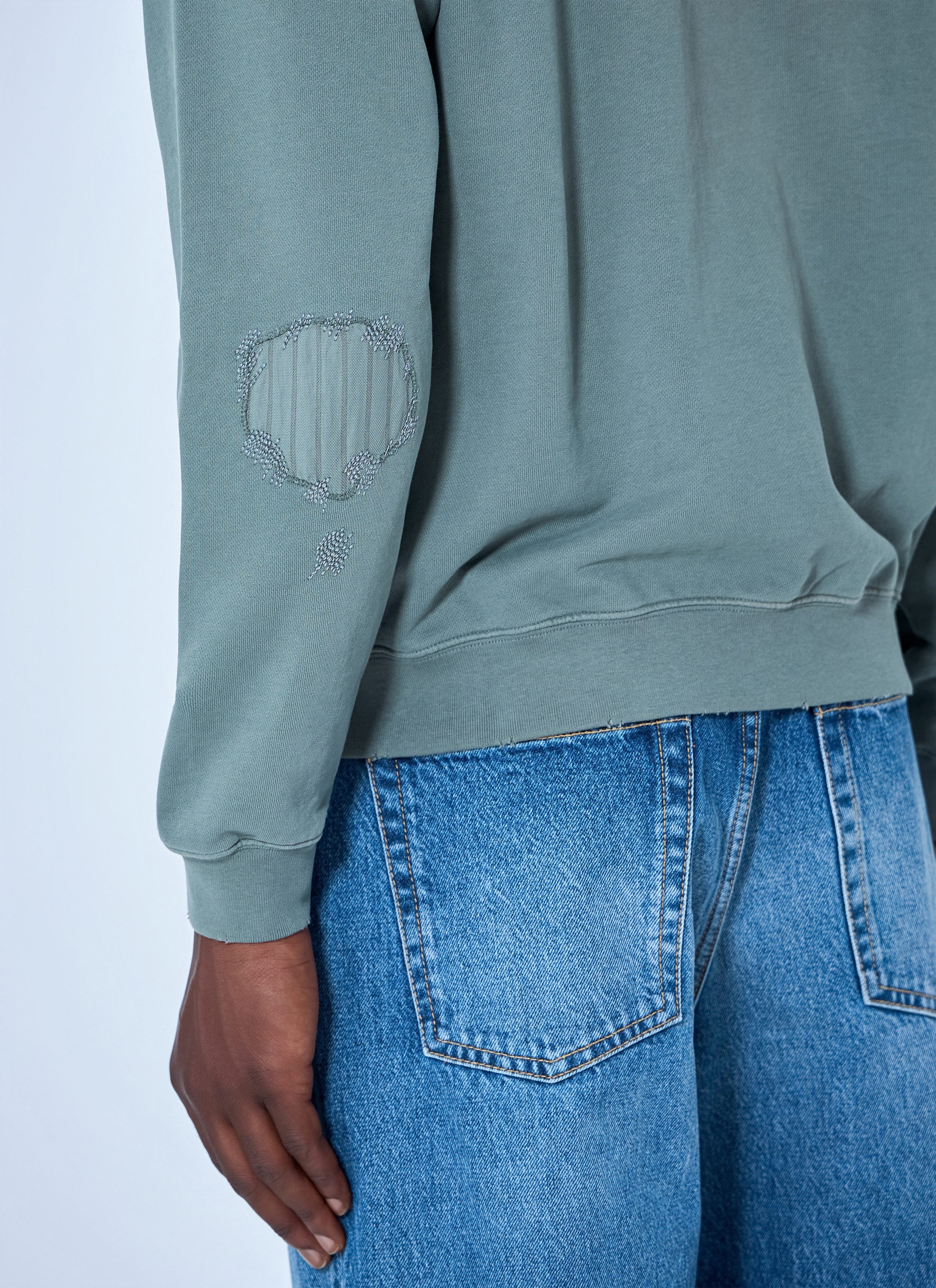 Mended fleece hoodie