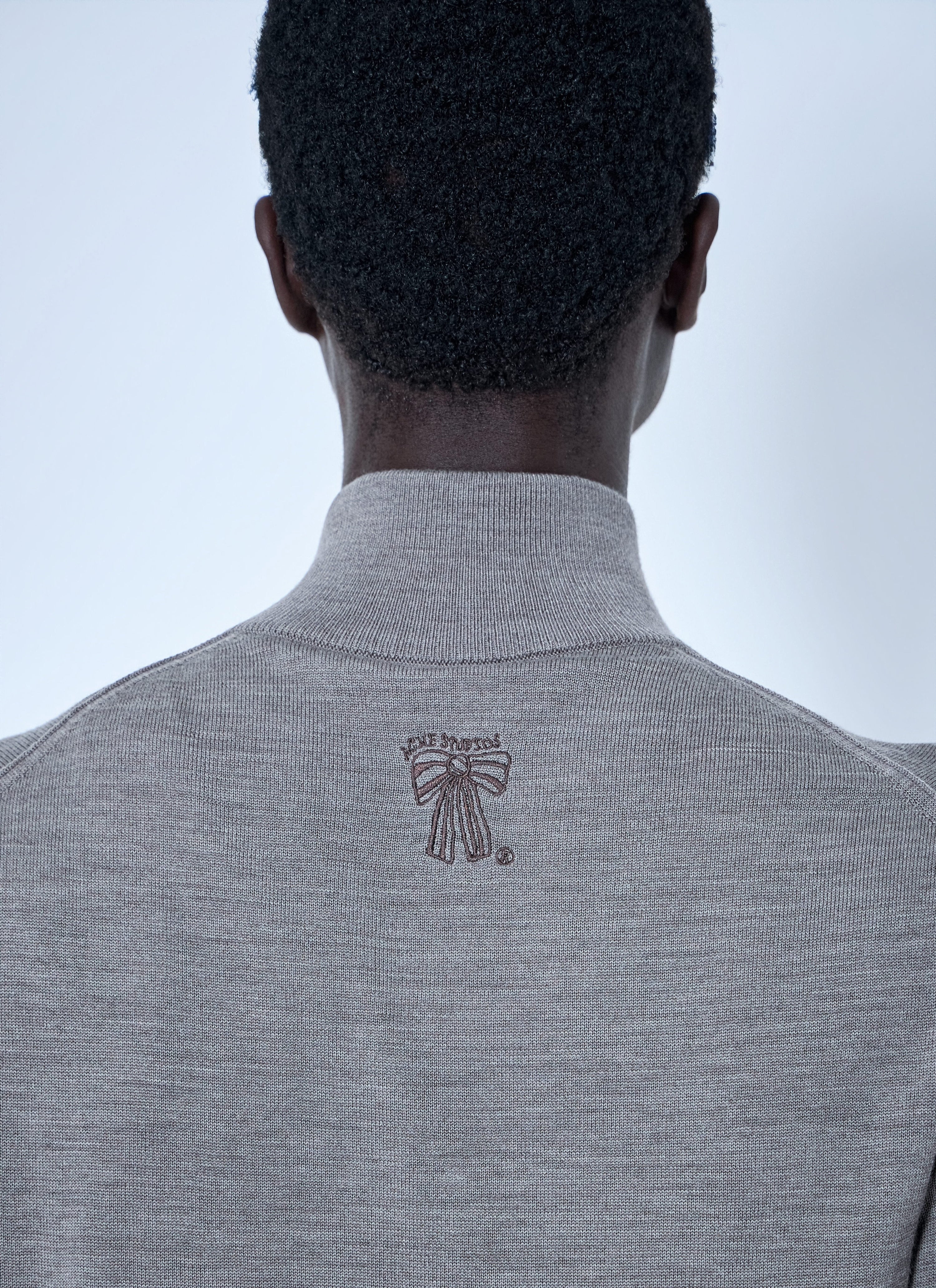 Zip-up bow logo cardigan