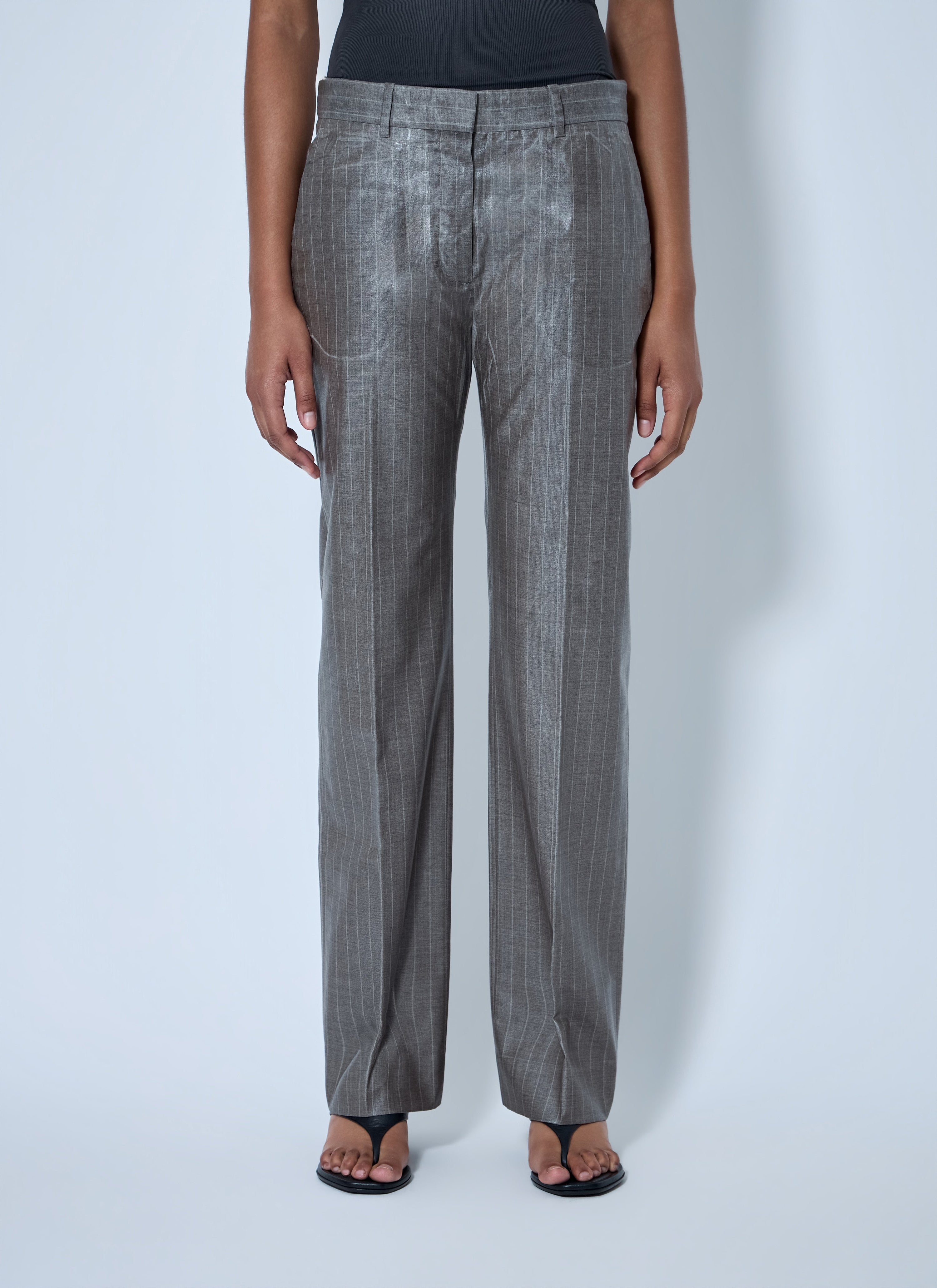 Coated pinstripe trousers