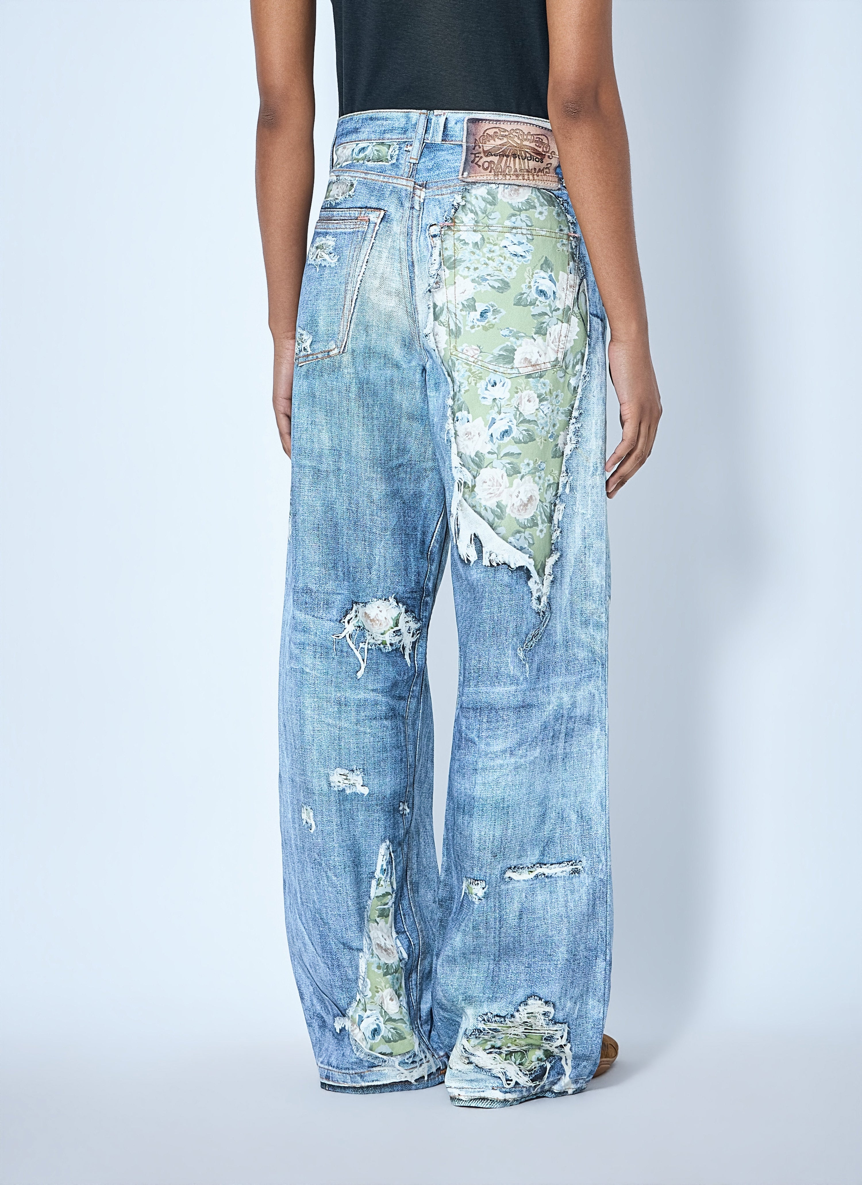 Distressed floral patchwork jeans