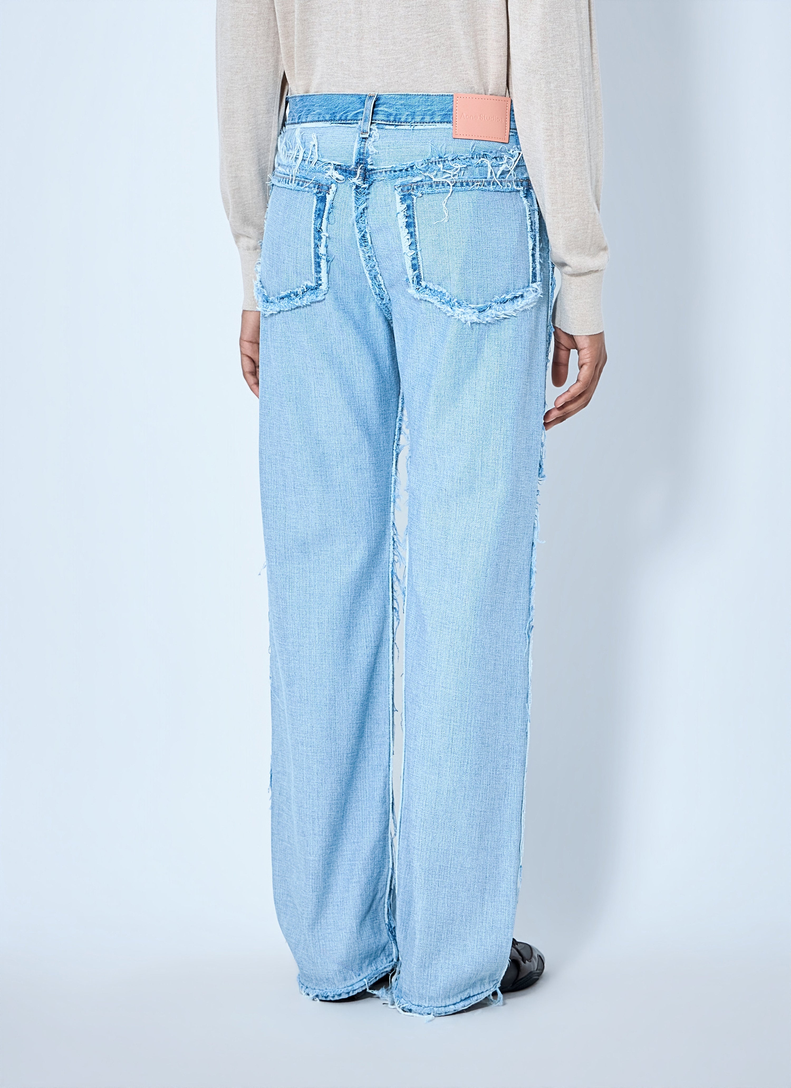 Frayed denim jeans