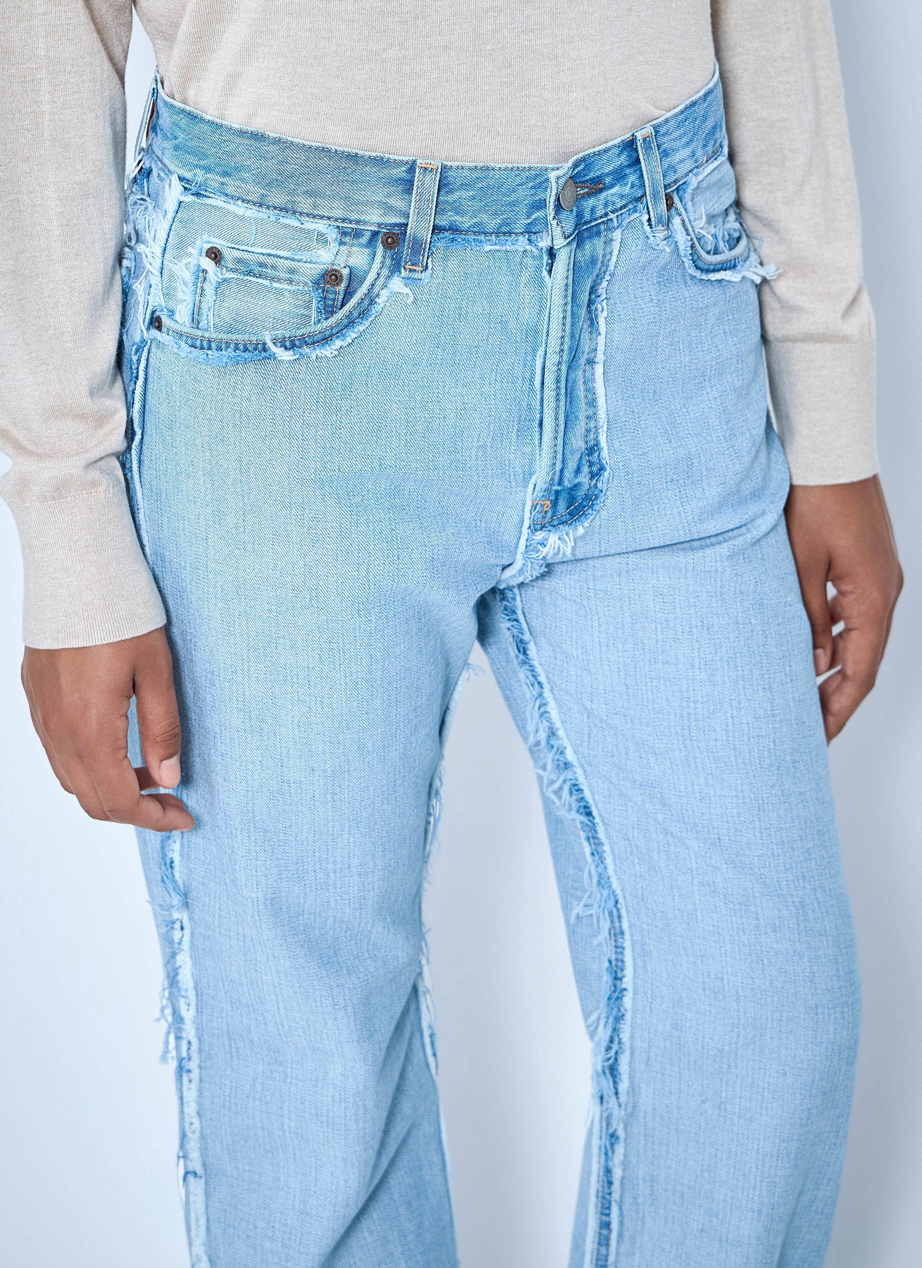 Frayed denim jeans