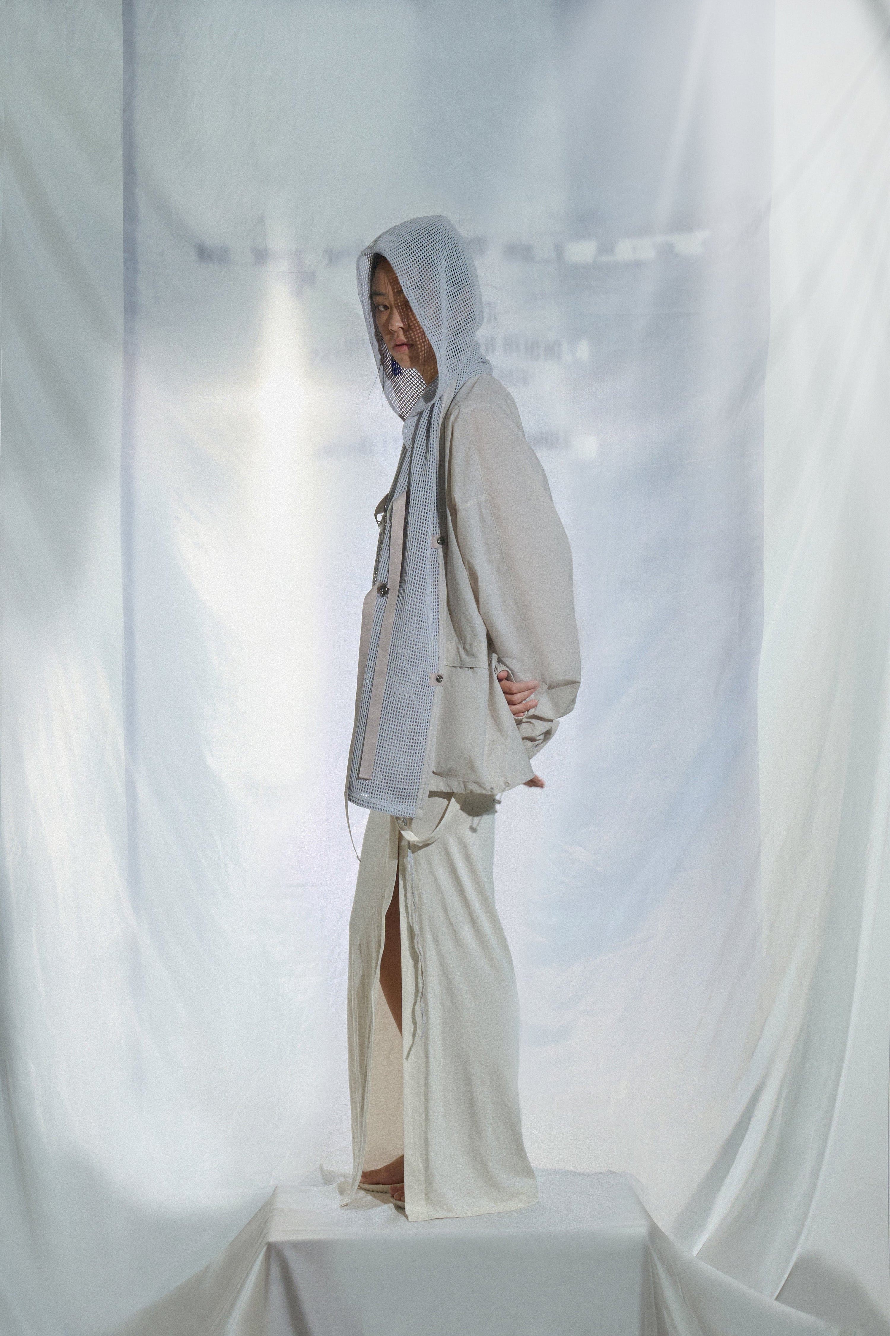 Convertible hooded windbreaker