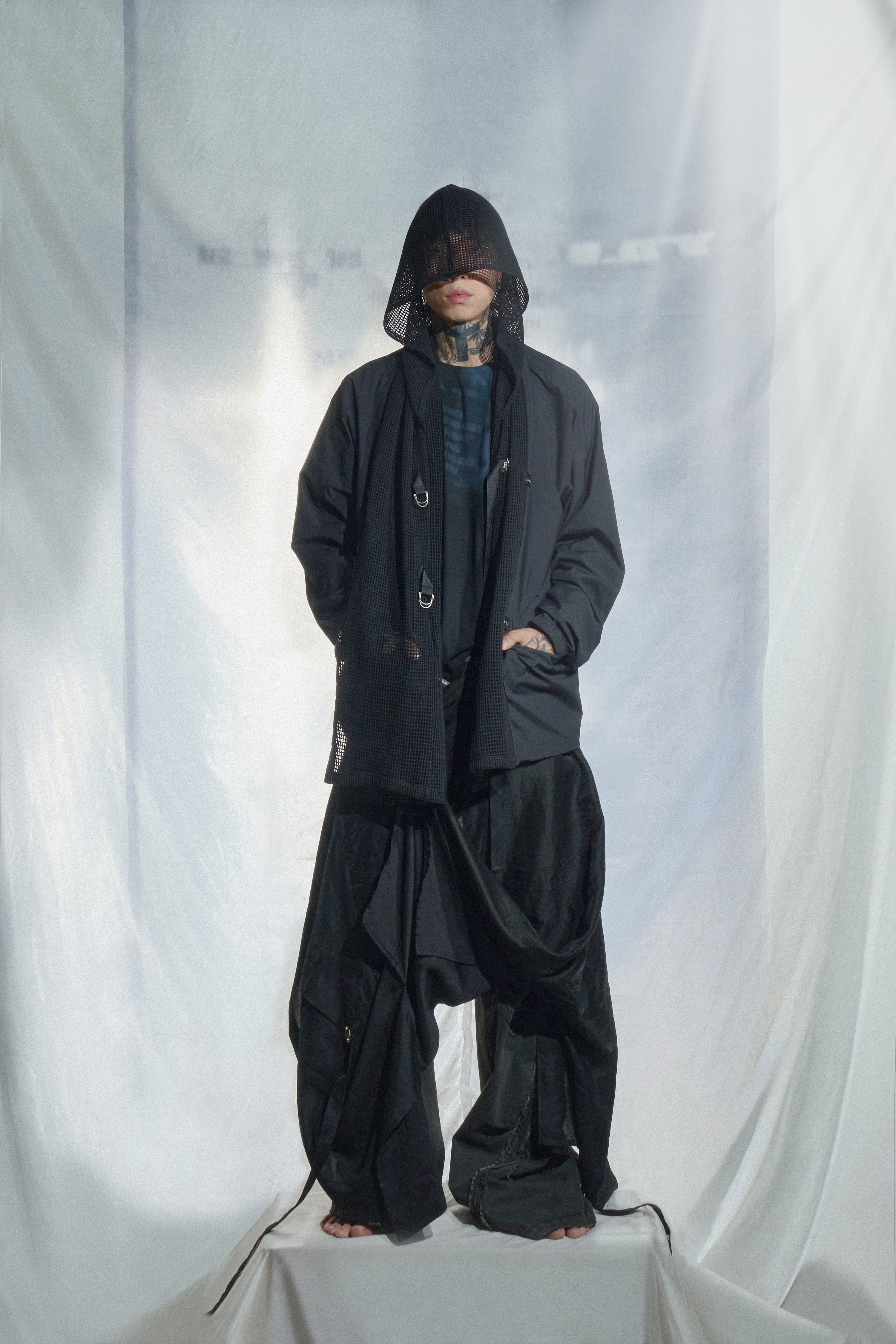 Convertible hooded windbreaker