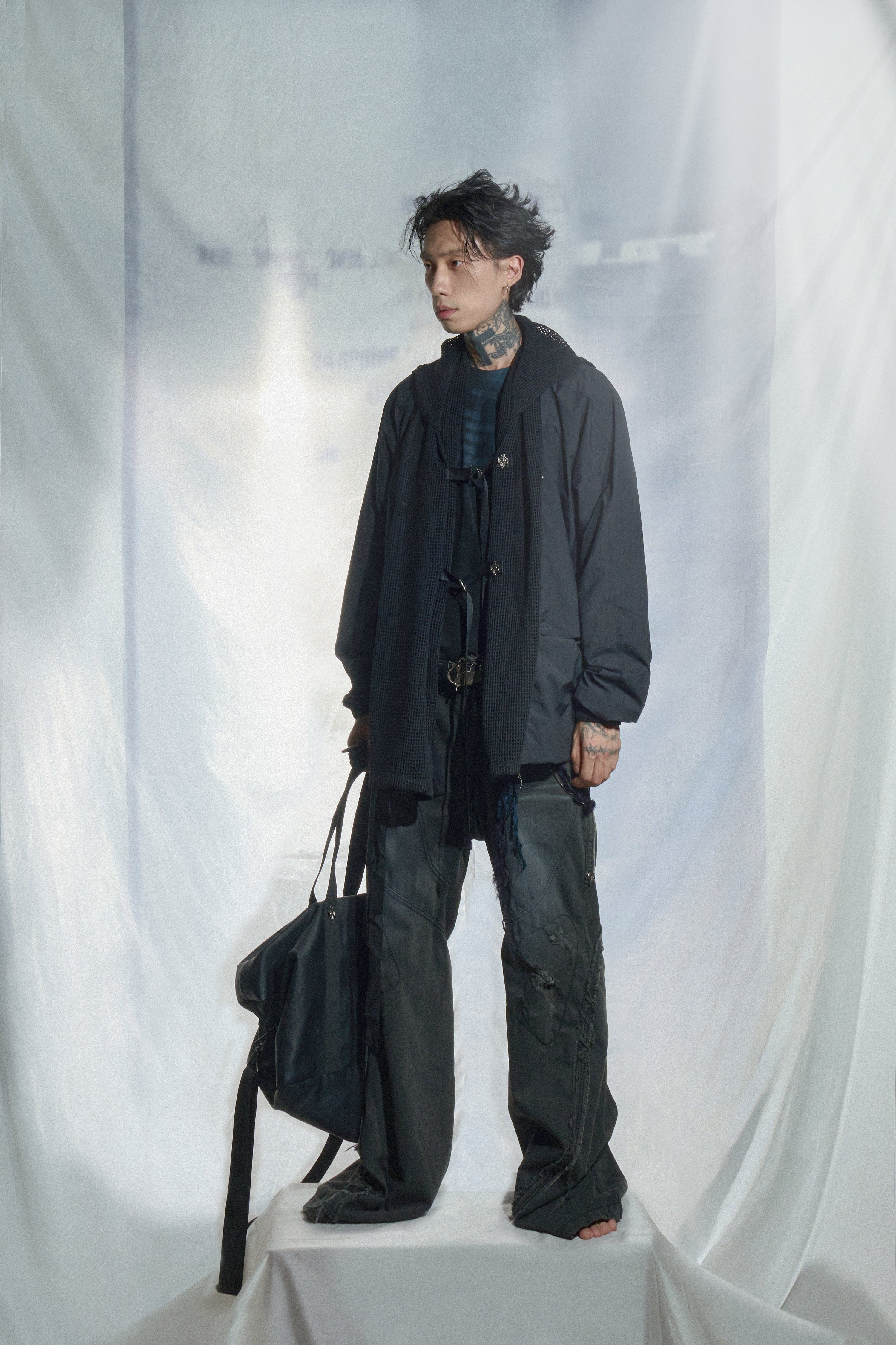 Convertible hooded windbreaker