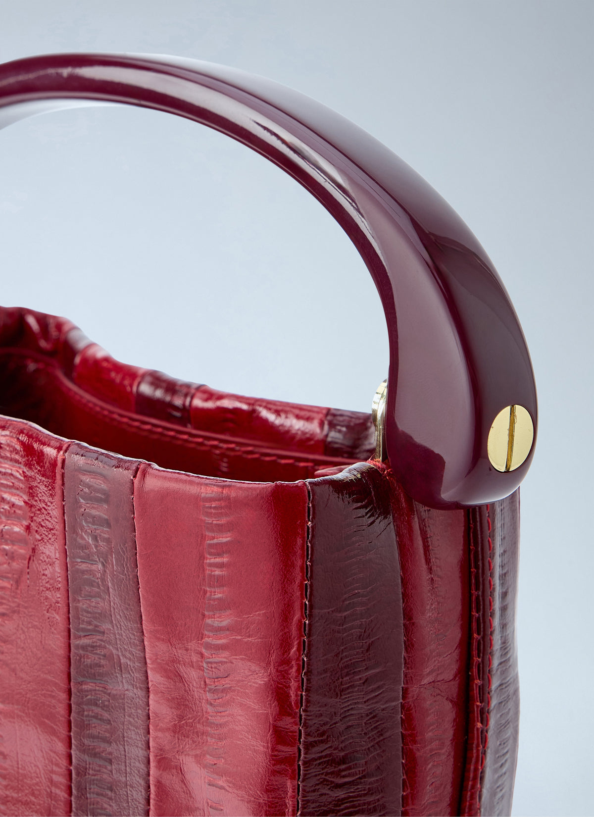 Striped handle handbag
