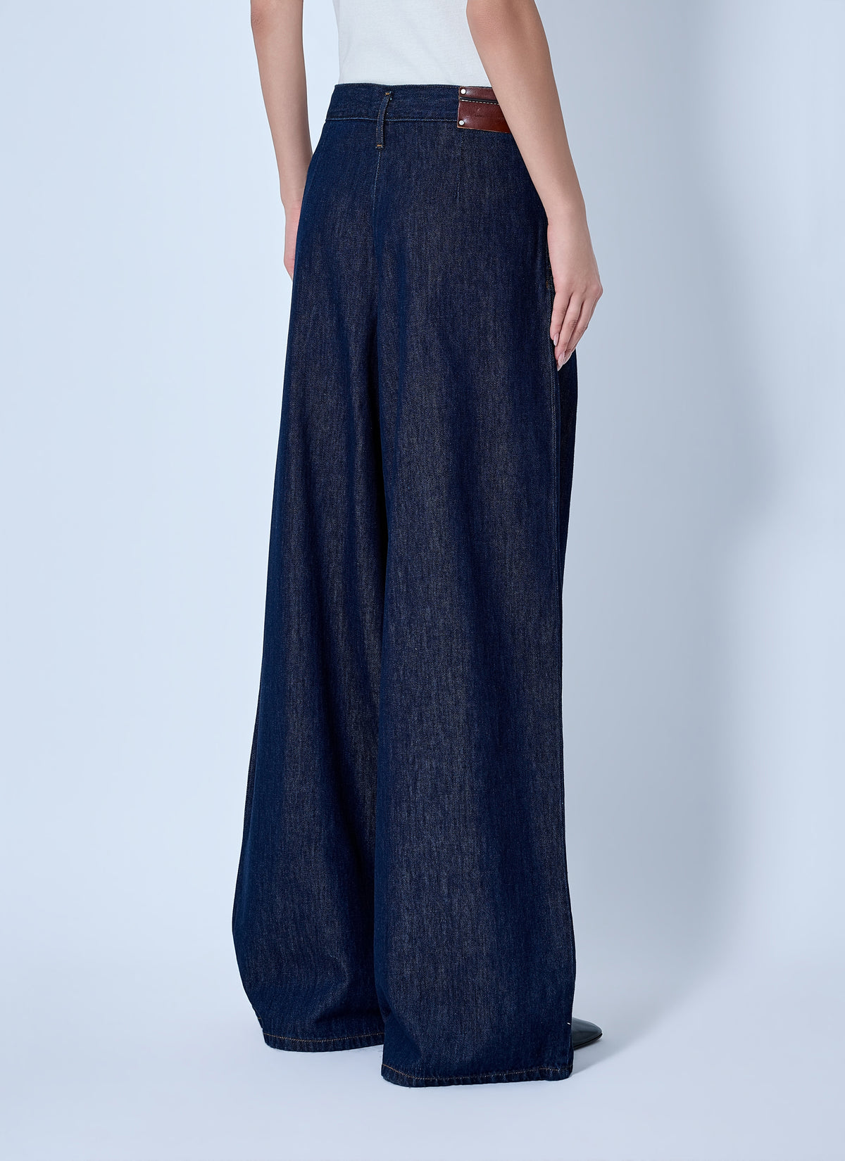 Wide-leg denim trousers