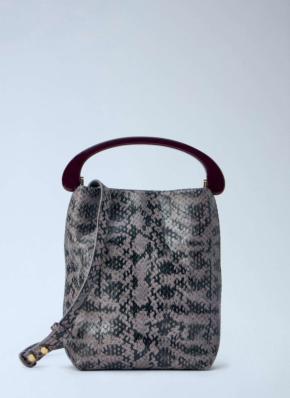 Snake-embossed leather top handle bag