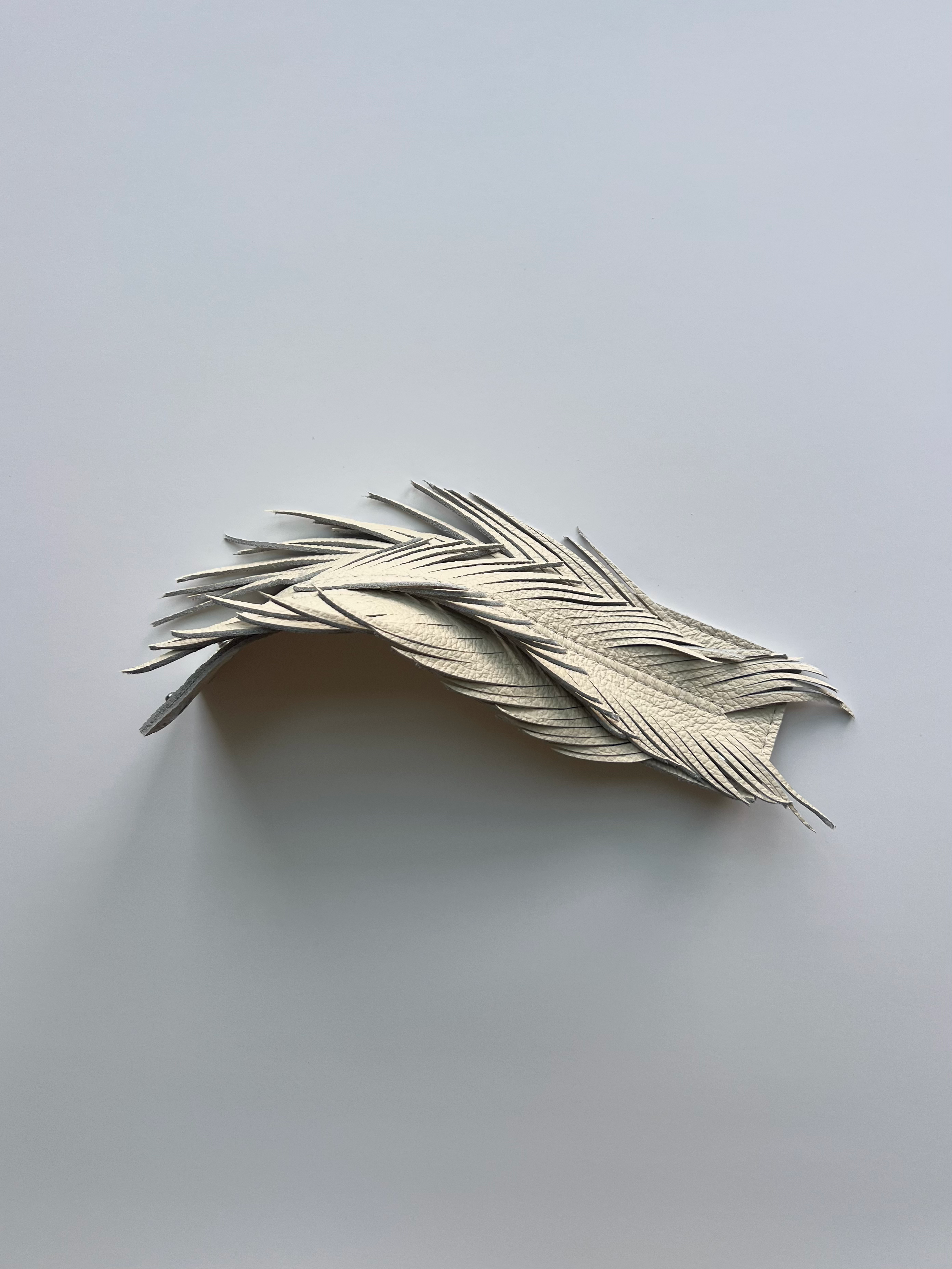 Leather feather cuff