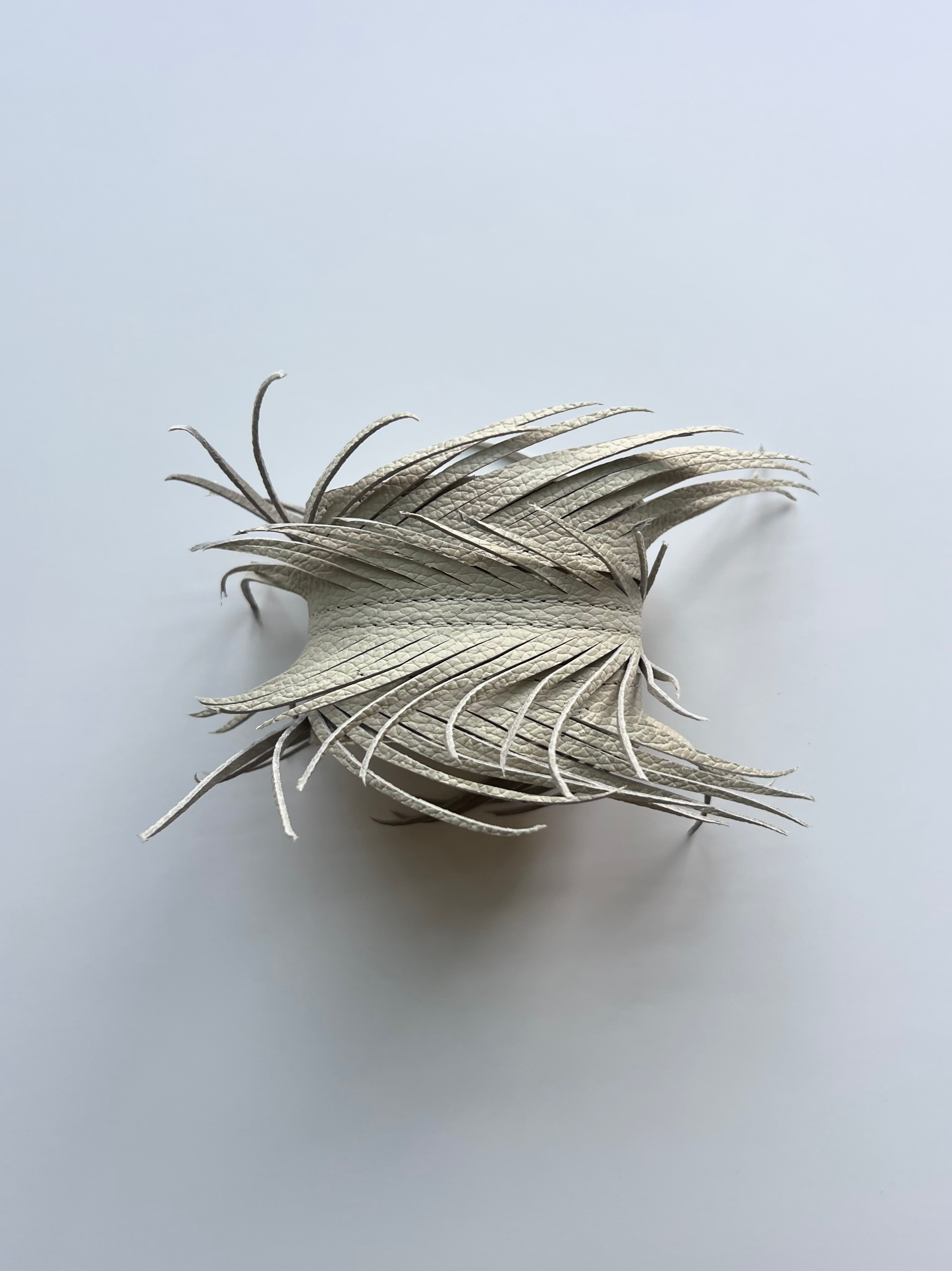 Leather feather cuff