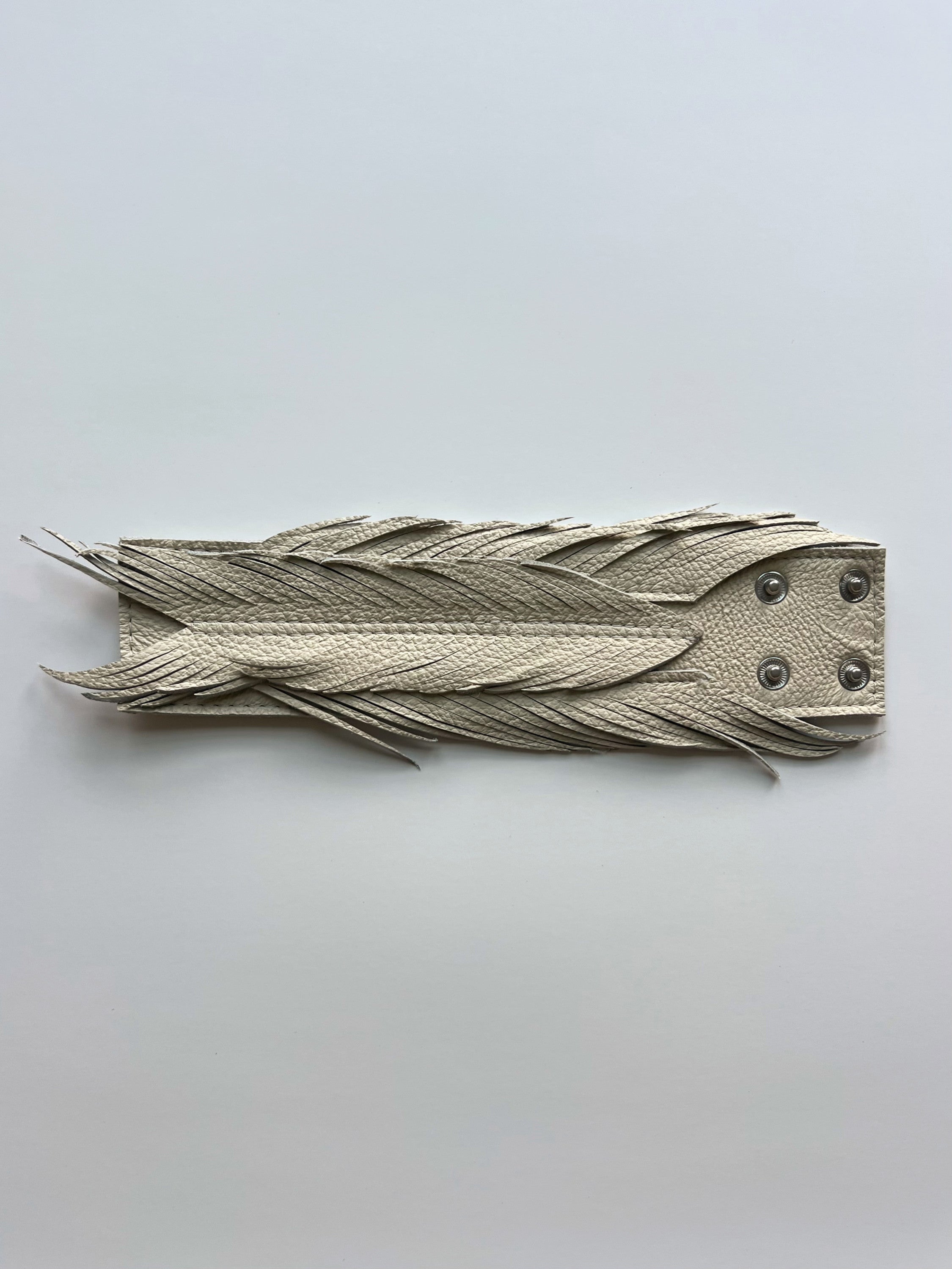 Leather feather cuff