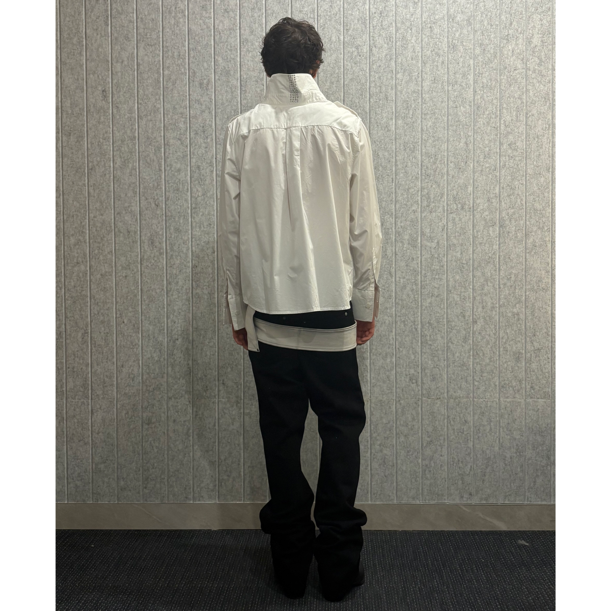 Belted leather-panel jeans
