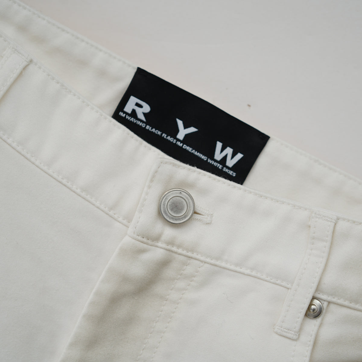 Belted moleskin pants in white