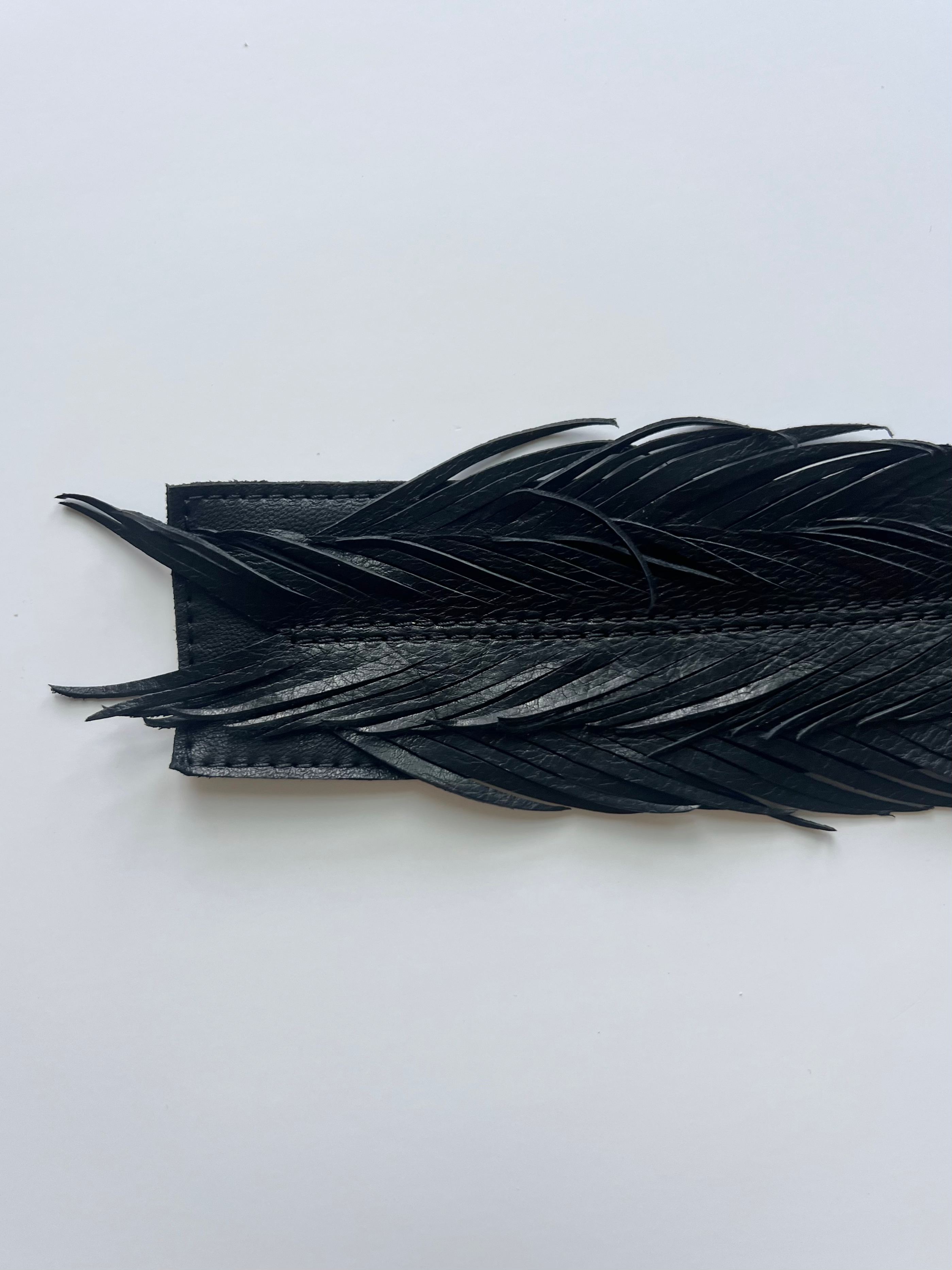 Leather feather cuff