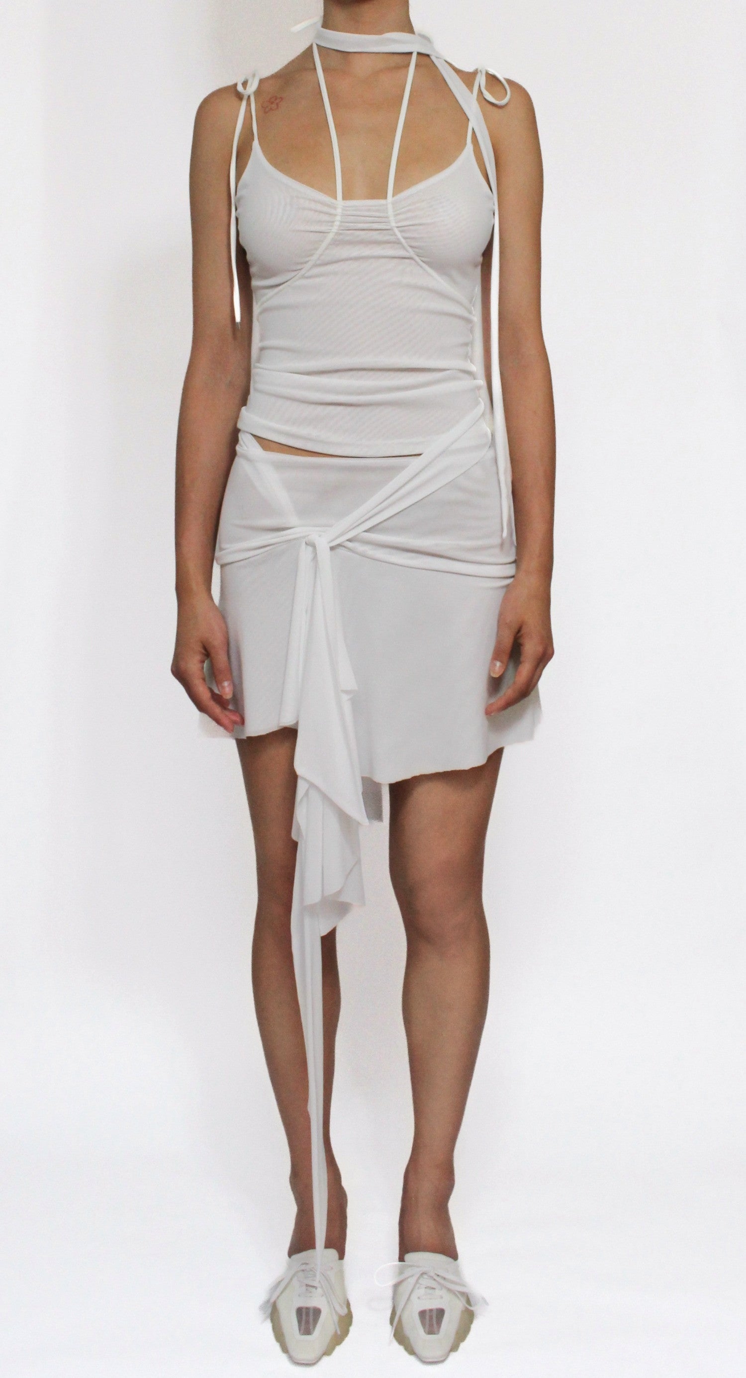 Illusion mesh draped mini skirt