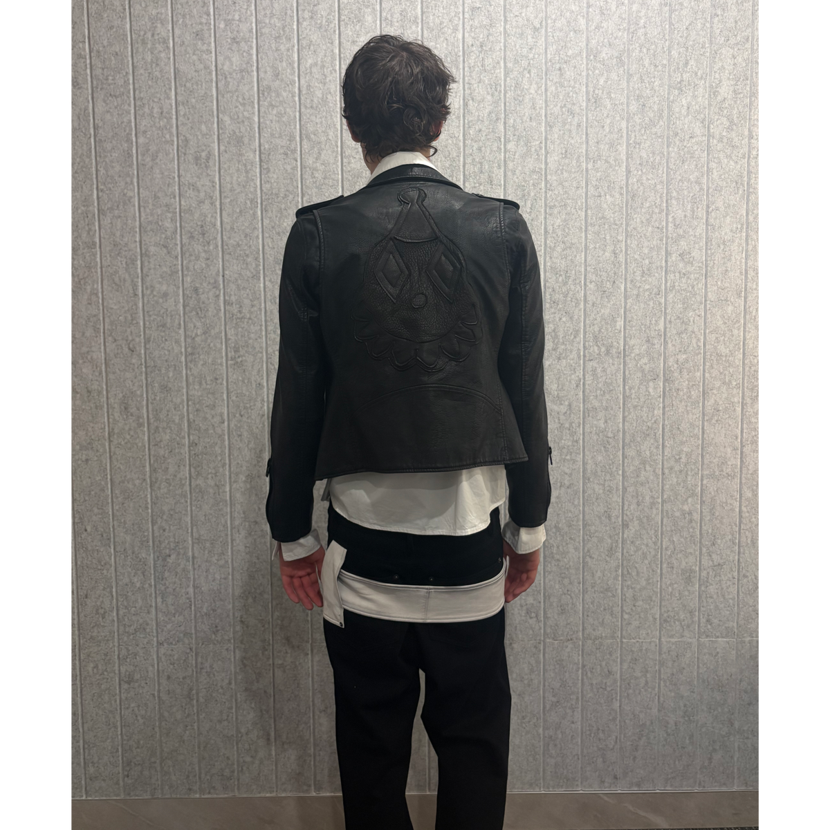 Belted leather-panel jeans