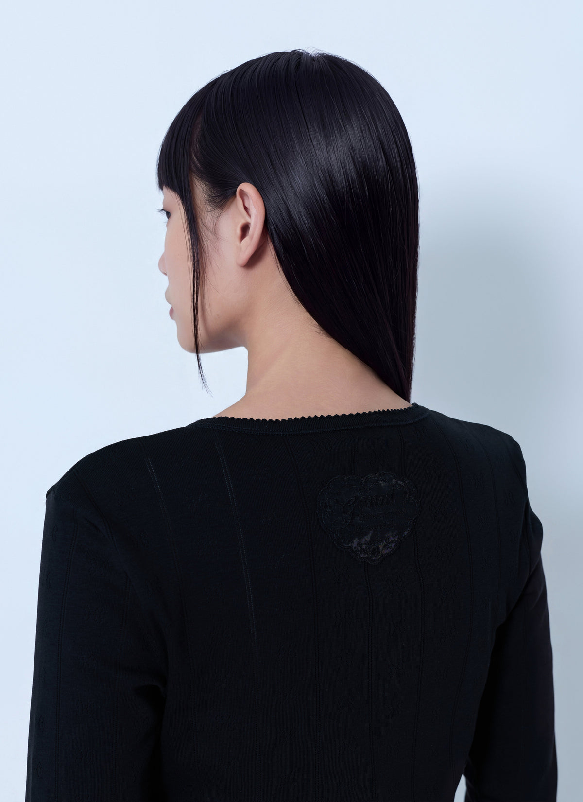 Compact pointelle rib jersey top