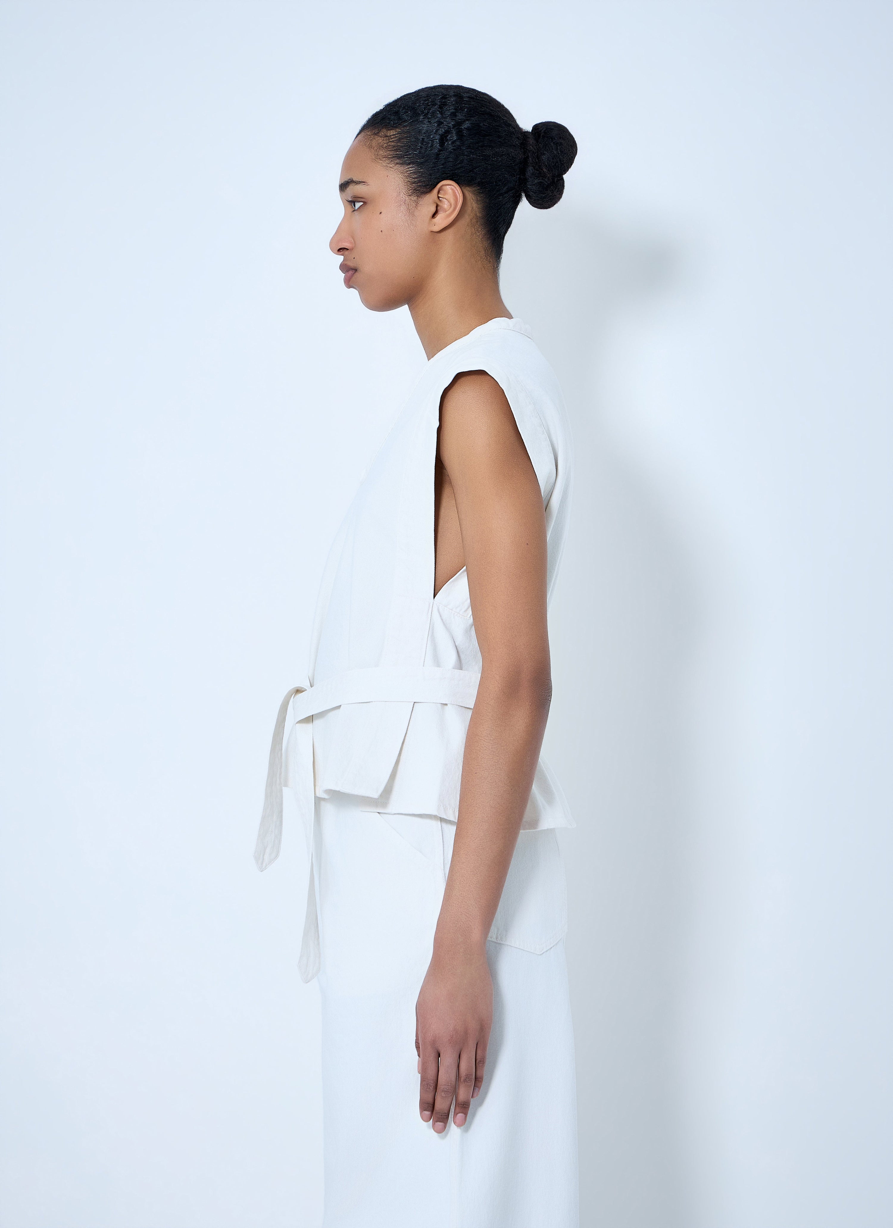 Sleeveless v-neck top with belted waist