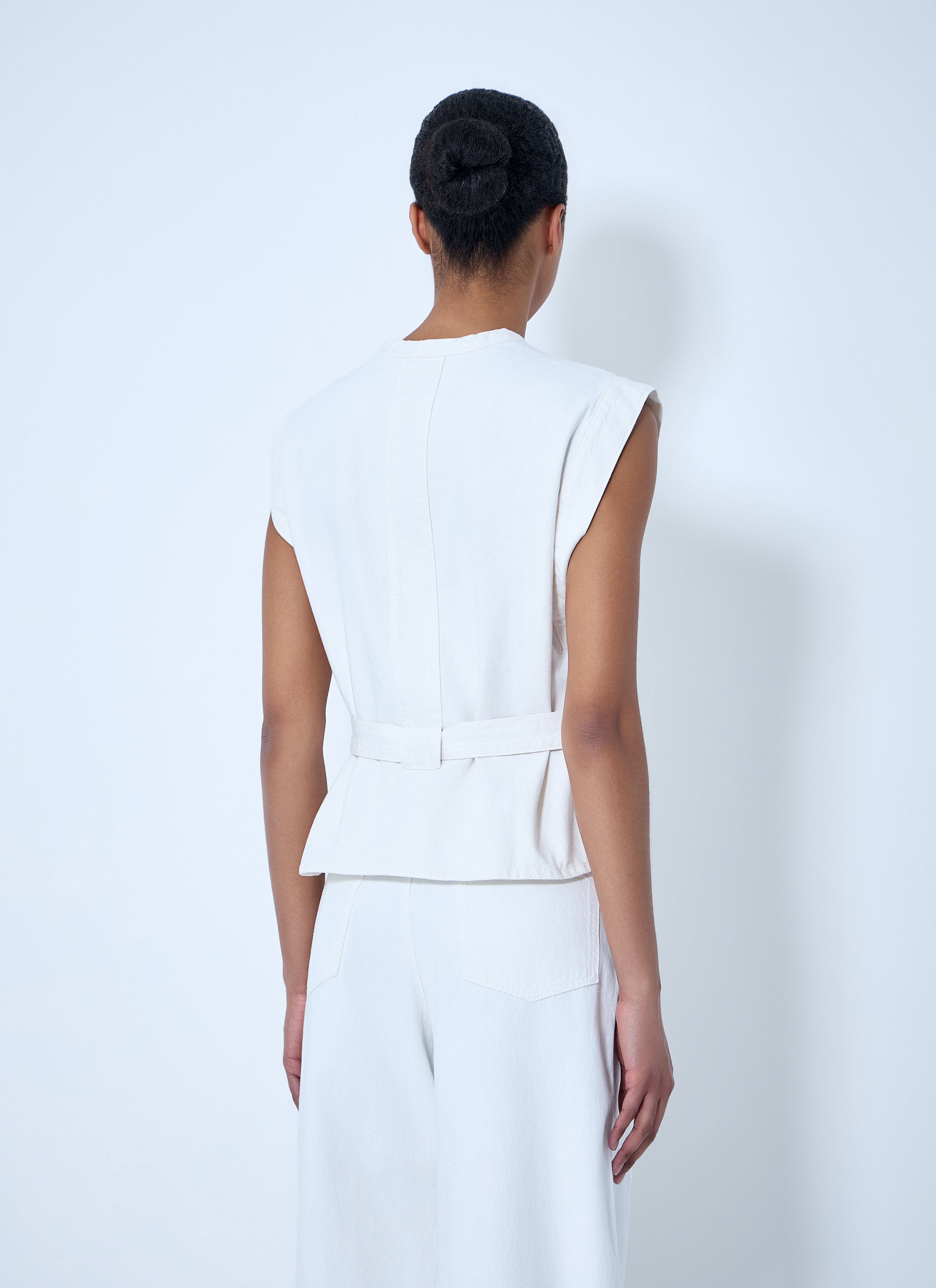 Sleeveless v-neck top with belted waist