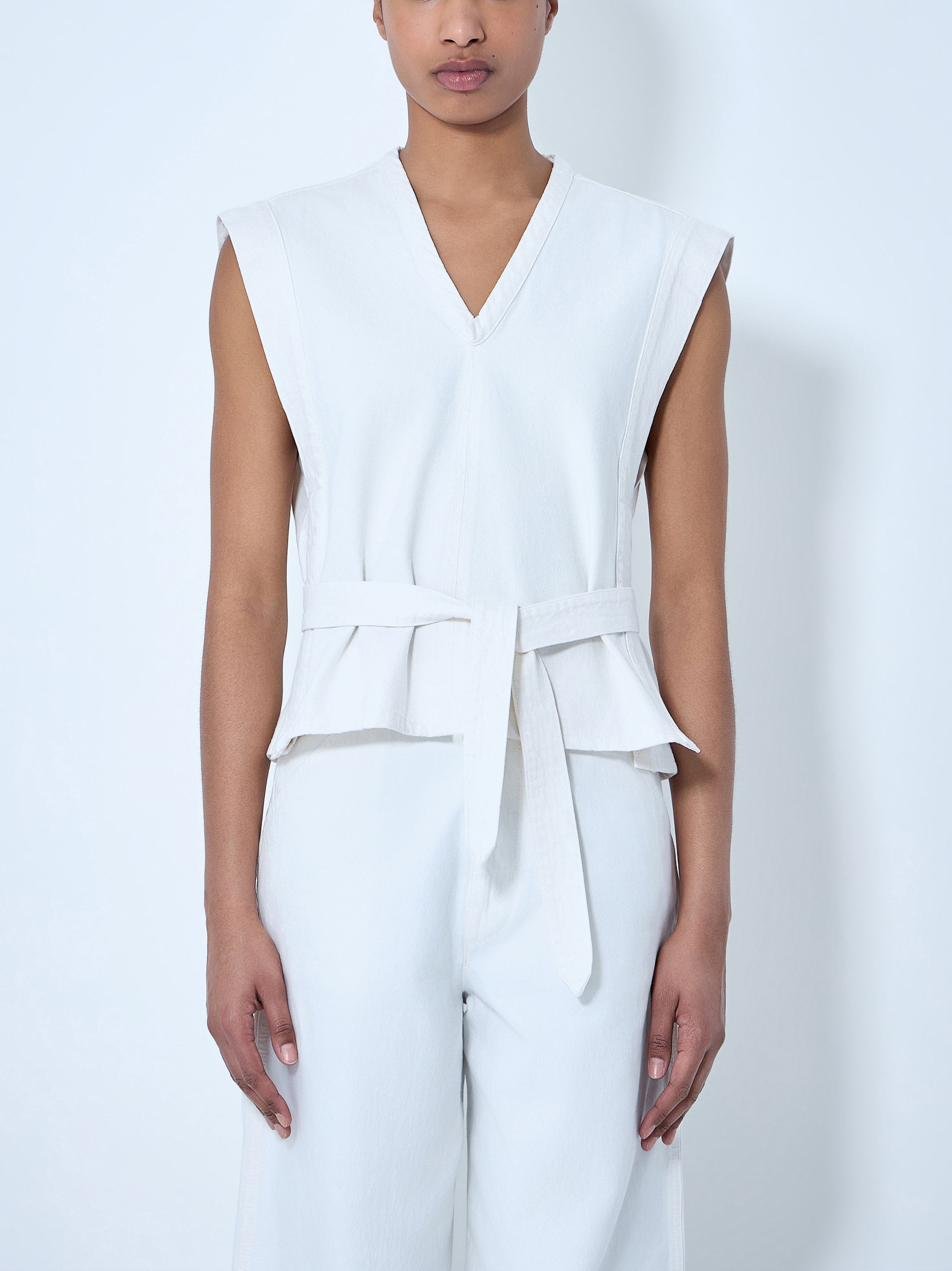 Sleeveless v-neck top with belted waist