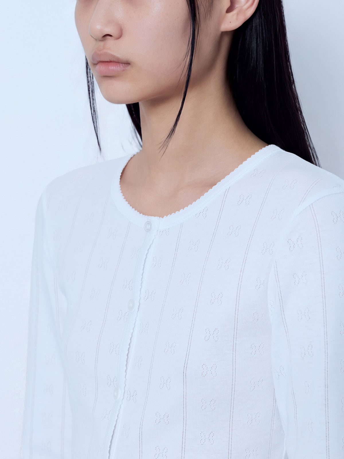 Compact pointelle rib jersey top