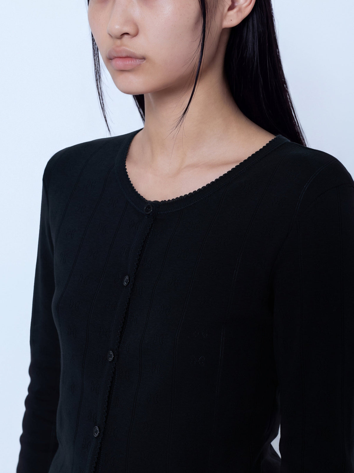 Compact pointelle rib jersey top