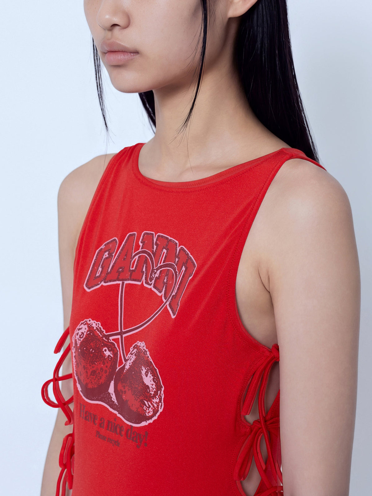 Swimsuit with tie strings cherry print