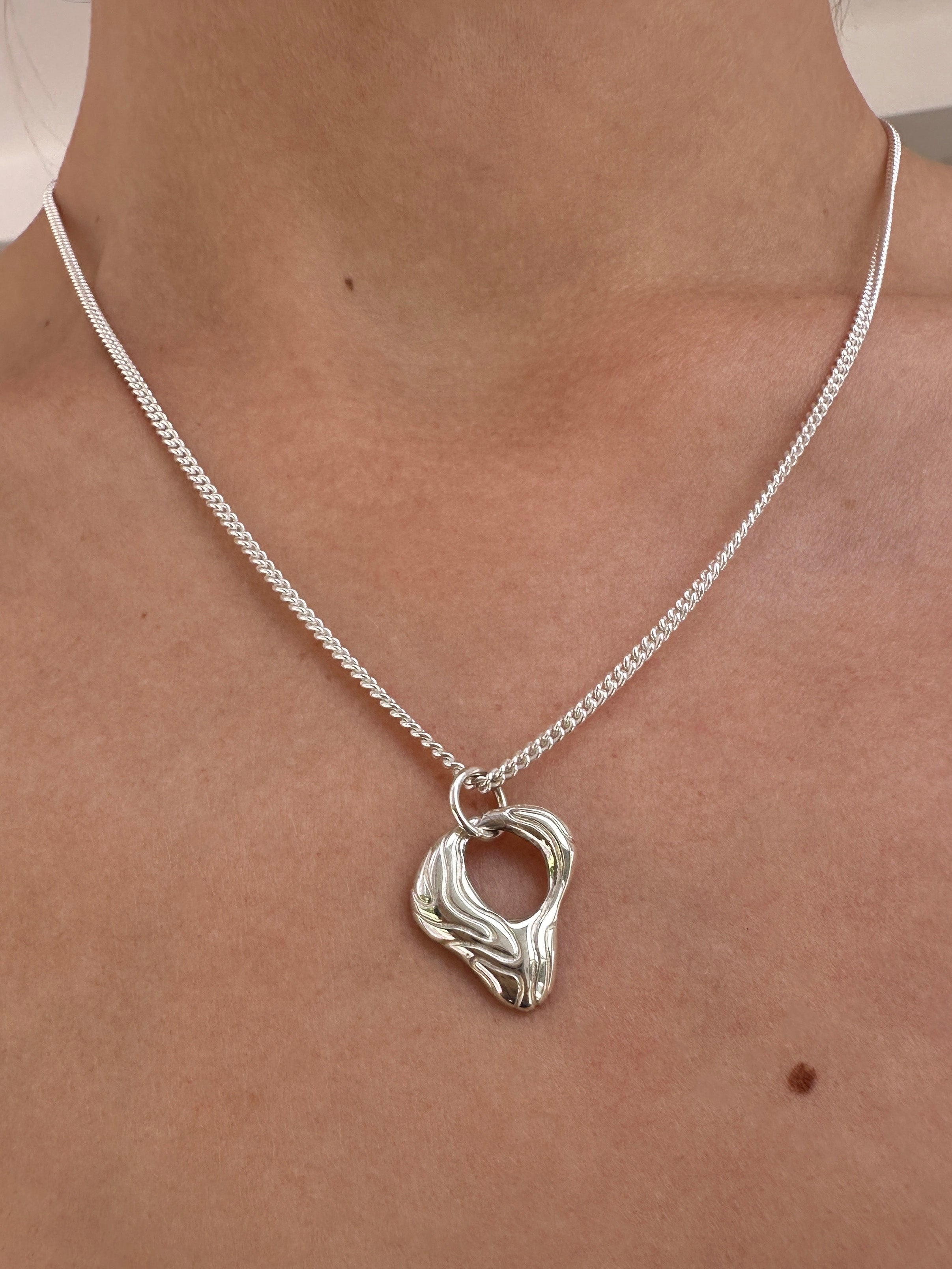 Mini island pendant necklace