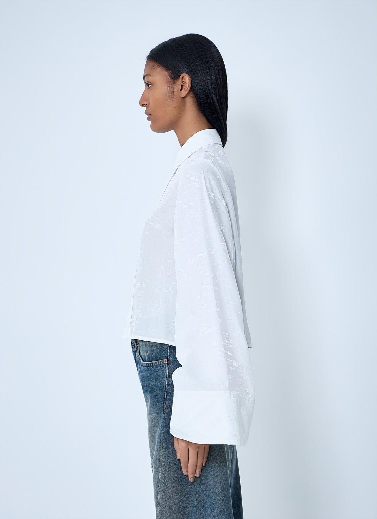 Button-down shirt with long flared sleeves